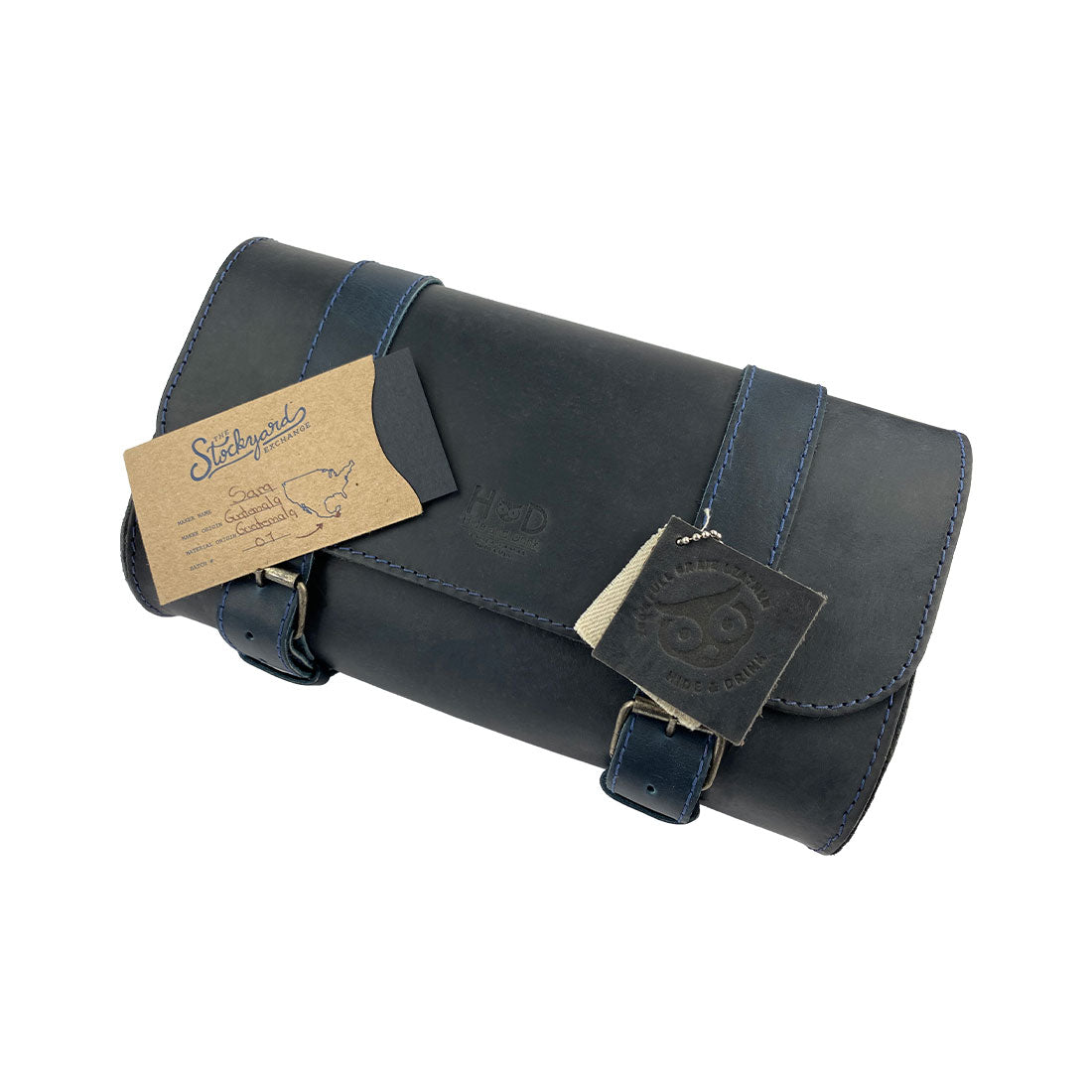 Hide & Drink Leather Motorcycle Tool Bag presenting a robust construction made from high-quality Full Grain Leather, tailored for those needing a reliable Biker Bag for Tools and Essentials. This practical Handlebar Bag with Adjustable Straps efficiently functions as a Tool Organizer, embodying the artisan's skills from La Antigua Guatemala & Oaxaca Mexico.