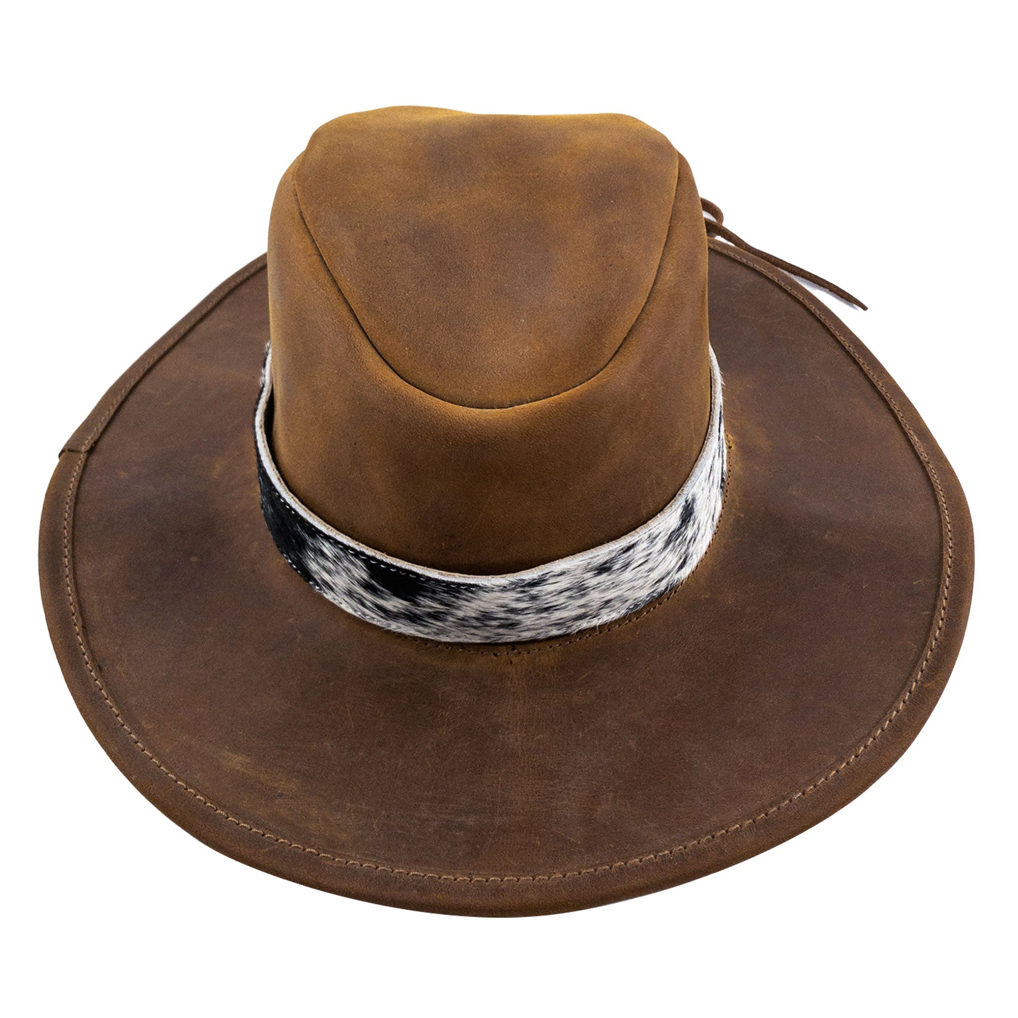 Classic Cowboy Hat showcasing a rustic style with Hair-On-Hide Full Grain Leather band from Western Leather Works. This striking hat is perfect for rodeo enthusiasts, adjustable to fit various sizes, and represents small batch production craftsmanship, handcrafted in La Antigua Guatemala and Oaxaca Mexico.