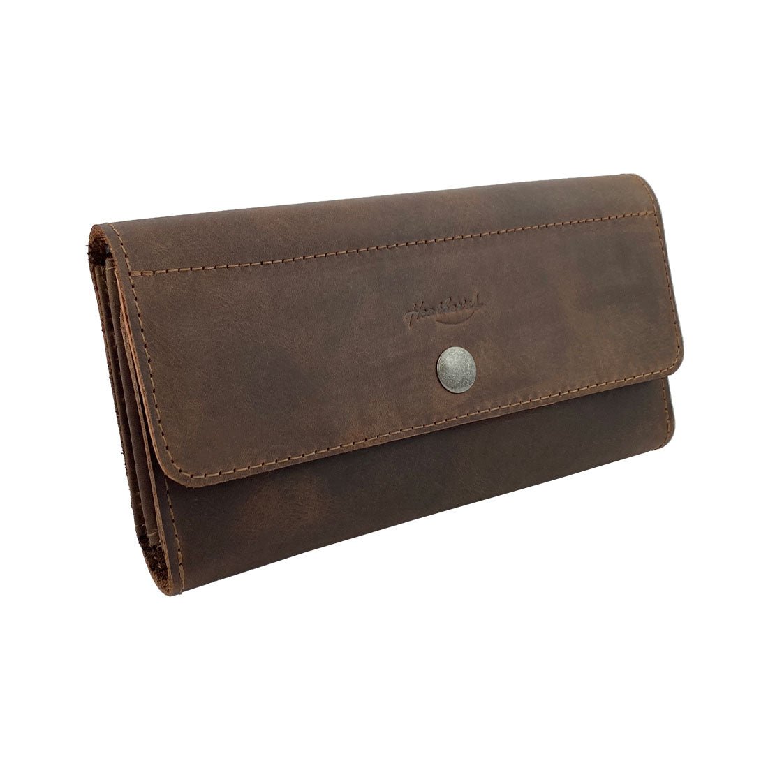Side view of Heather's Tri Fold Folio Wallet, highlighting its elegant design and artisan craftsmanship. This Tri Fold Folio Wallet is a minimalist choice for women, combining style and practicality as a card saver with a button closure, made from fine full grain leather in La Antigua Guatemala & Oaxaca Mexico.