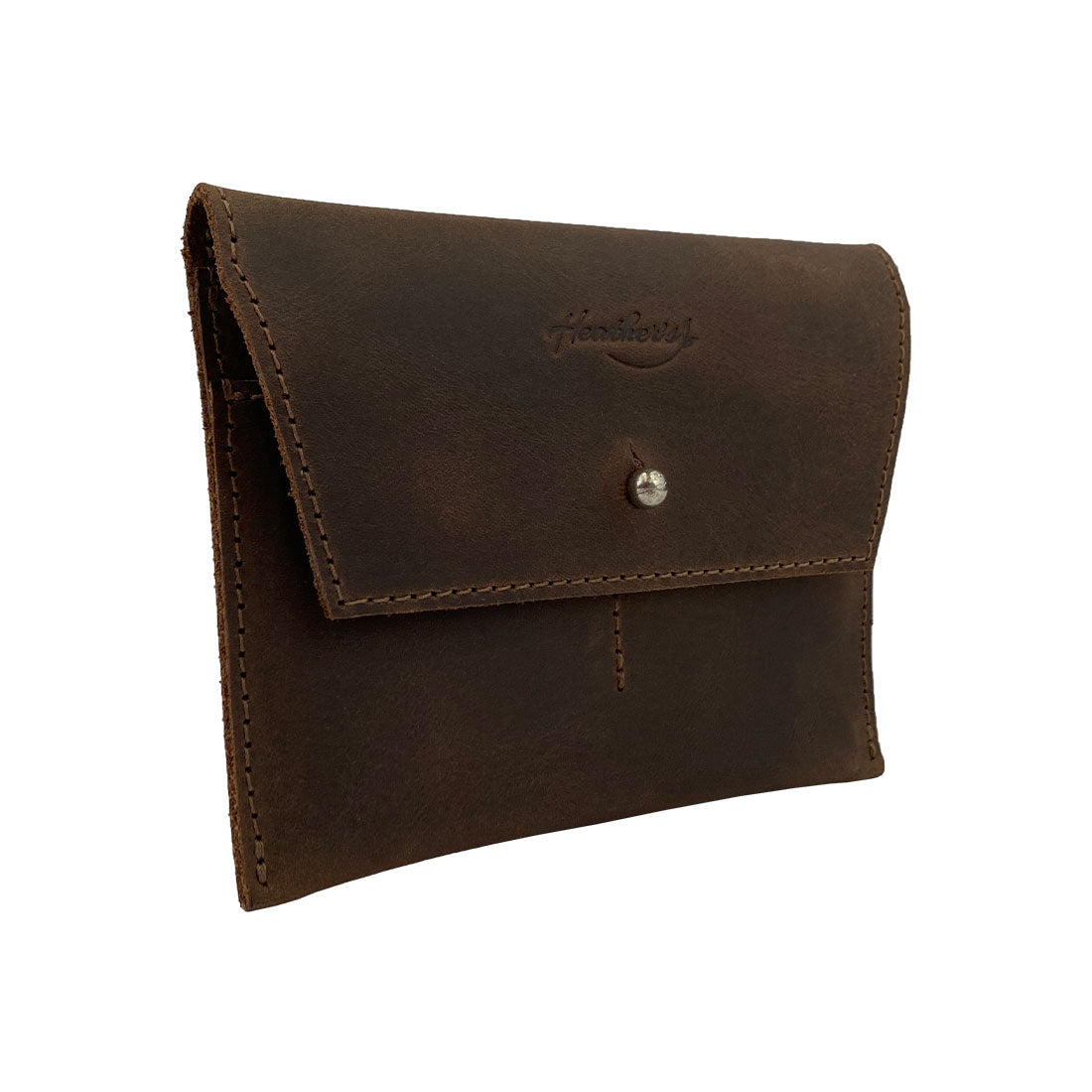 Side angle of Heather's Minimalist Wallet, crafted from full grain leather for durability and style. This handy cash organizer and card holder is ideal for everyday use and travel, representing artisan craftsmanship in small batch production. Handmade in La Antigua Guatemala & Oaxaca Mexico.