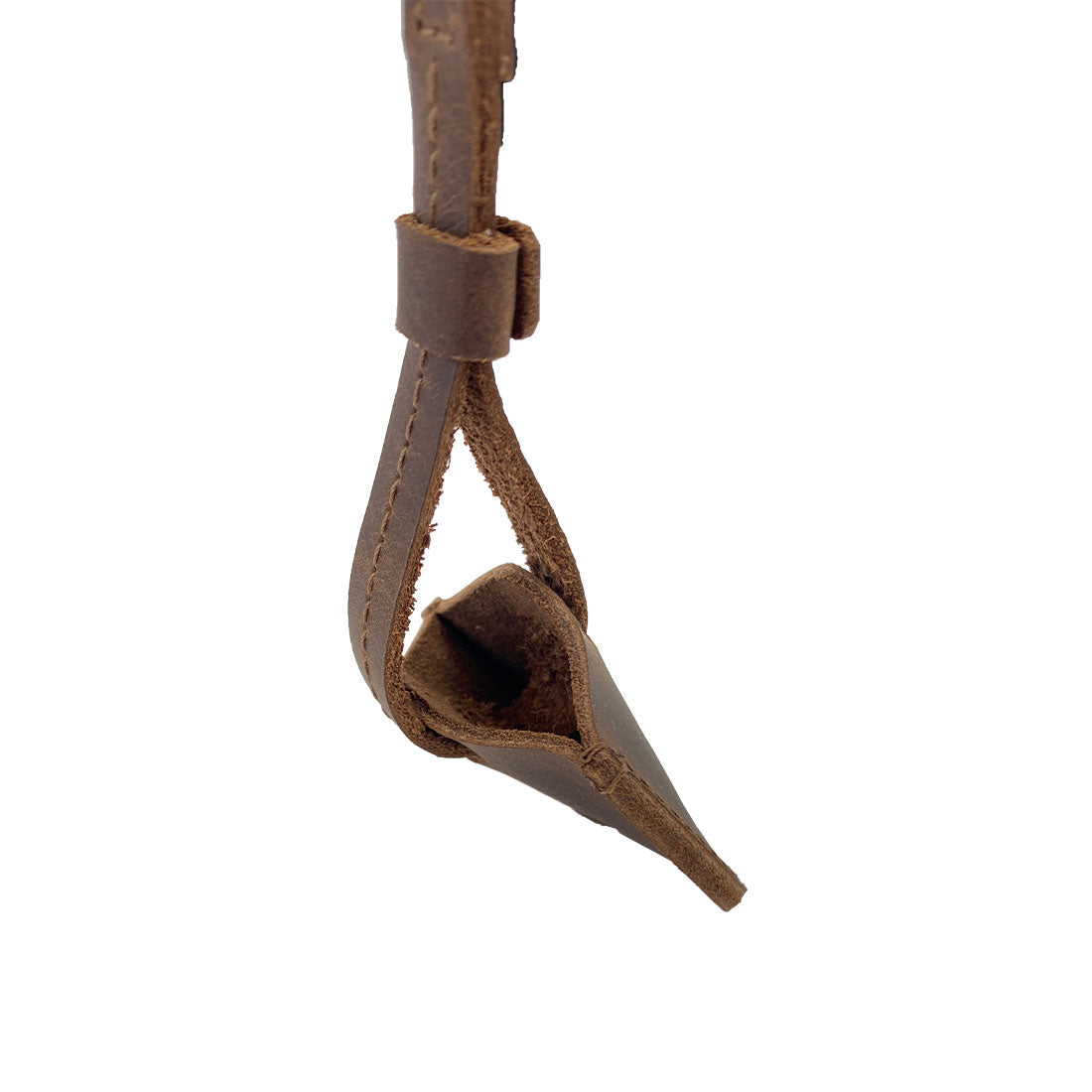 Detailed image showcasing the LeatherTex Rustic Strap Keyring for AirTag, designed to hold and protect keys. This keychain holder for car and home is a key organizer accessory crafted from full grain leather, hand cut and sewn in La Antigua Guatemala.