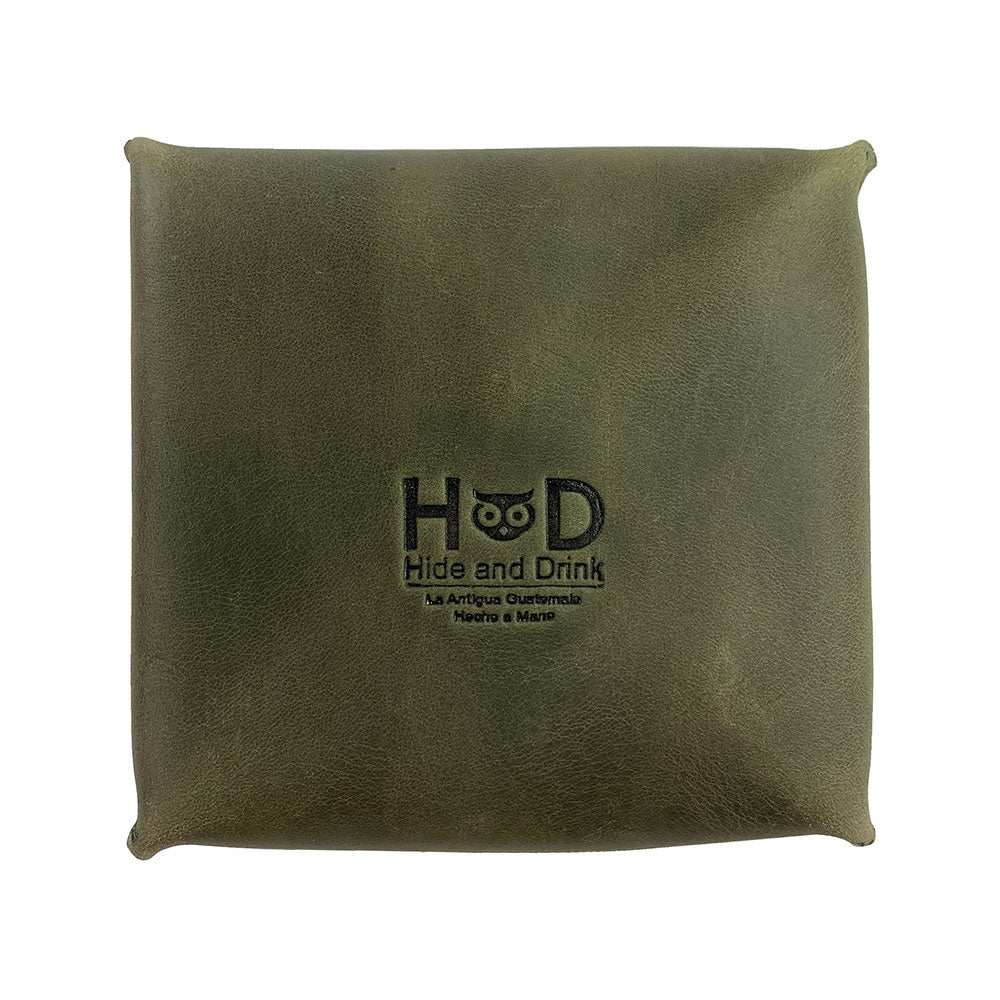 Front view of a Hide & Drink Jewelry Pouch highlighting its unique leather texture. Perfectly suitable for rings and other small trinkets, enhancing wedding celebrations.