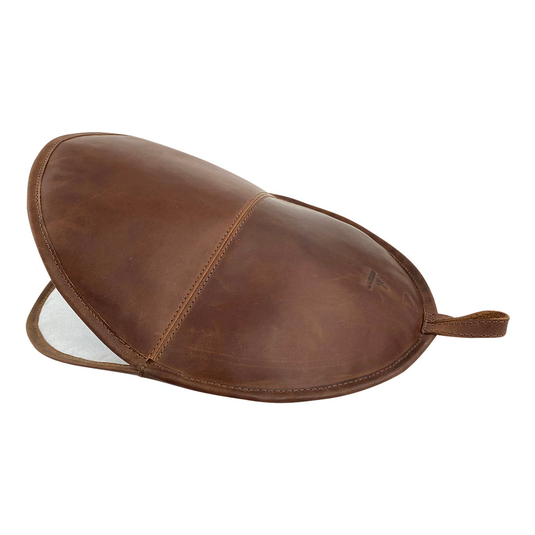 Side view of a Tortilla Warmer by Cast Leather Co., illustrating the full grain leather exterior designed for heat retention. This Tortilla Warmer Pouch is a Fabric Tortilla Heater Pouch, emphasizing the artisanal approach with small batch production, hand cut, hand sewn, and fire branded in La Antigua Guatemala & Oaxaca Mexico.