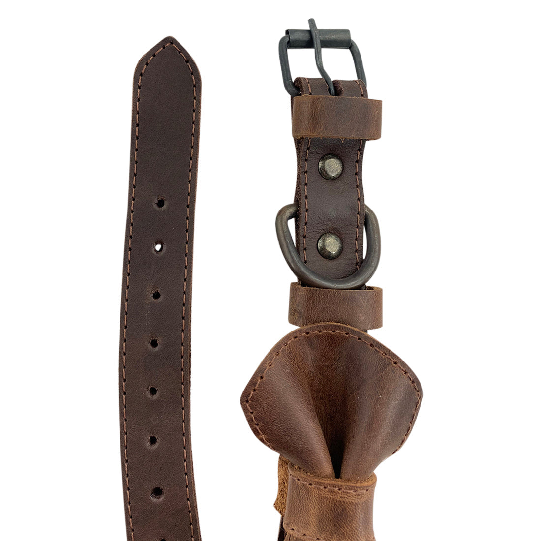 Close-up of the adjustable Leather Bow Tie Collar by Taco Dog, highlighting the quality materials used in its creation. Perfect for small dog breeds, this rustic collar combines elegance with durability. Each piece is handmade by artisans, showcasing the beauty of small batch production and hand sewn details for your puppy's style.