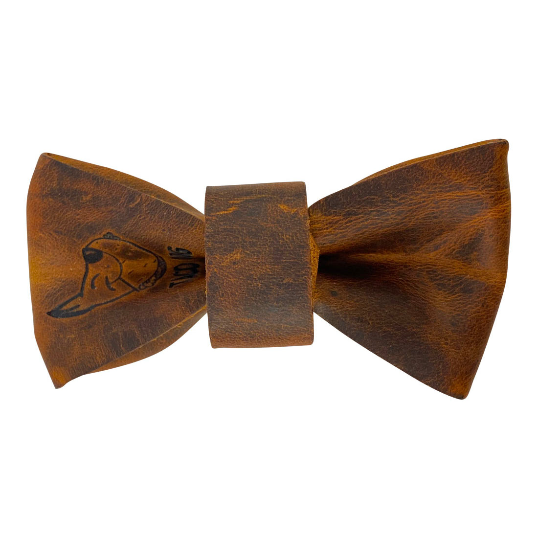 Detailed view of a leather bow tie for dogs by Taco Dog featuring stylish branding. Perfect for any occasion, this Bow Tie for Dog Collar easily fits onto most collars (1.25 in. wide). Bow Tie for Dogs - Attaches onto Most Dog Collars (Collar Not Included) - Fancy Cute Stylish Pet Accessory Attachment, Full Grain Leather, StockyardX, Small Batch Production, Hand Cut, Hand Sewn, Fire Branded, Artisan, Handmade in La Antigua Guatemala & Oaxaca Mexico.