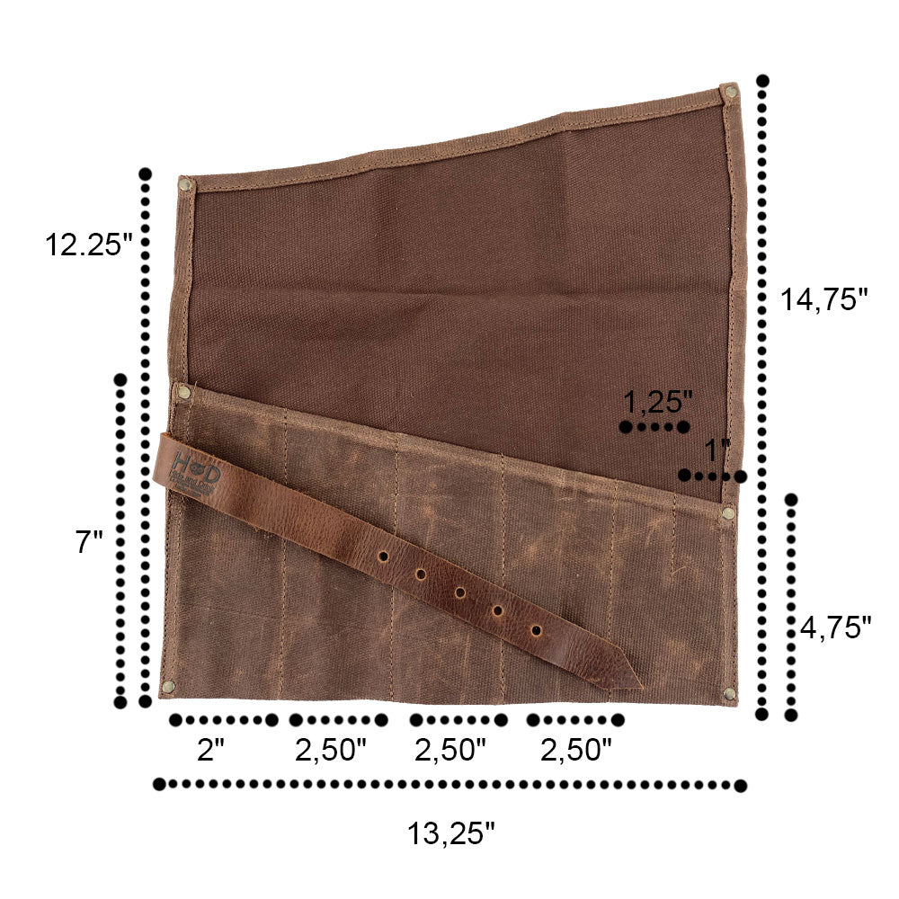 A display of the Large Tool Roll from Hide & Drink, perfect for storing hand tools. This Portable Carry-On Pouch contains 6 slots for woodworking tools. Made from waxed canvas and full grain leather variations, this artisan product represents small batch craftsmanship, skillfully hand cut and hand sewn in La Antigua Guatemala & Oaxaca Mexico.
