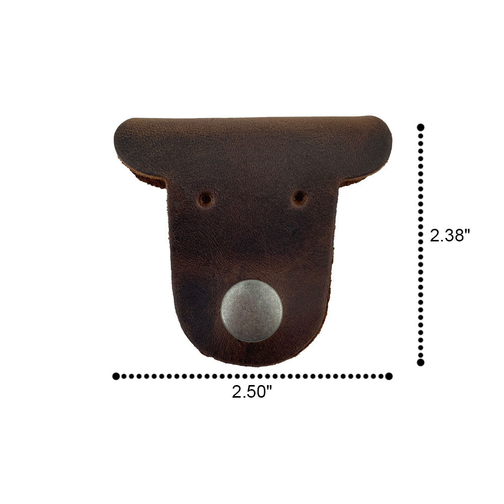 Close-up of two brown Dog Shaped Cord Keepers, demonstrating quality and functionality provided by Hide & Drink and made from Full Grain Leather. Dog Shaped Cord Keeper (Cord Clam) 2-Pack, Full Grain Leather, StockyardX, Small Batch Production, Hand Cut, Hand Sewn, Fire Branded, Artisan, Handmade in La Antigua Guatemala & Oaxaca Mexico.
