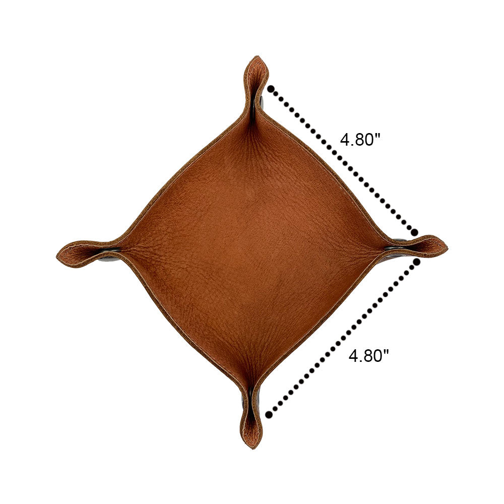 Top view of the Valet Tray with Sheep Skin by Hide & Drink, showcasing an elegant catchall design measuring 4.80" x 4.80". This handmade accessory is crafted from Full Grain Leather & Sheepskin, making it a perfect storage solution for personal items. A must-have for home and travel essentials, each tray is artisan-made in La Antigua Guatemala & Oaxaca Mexico, emphasizing small batch production and quality craftsmanship.