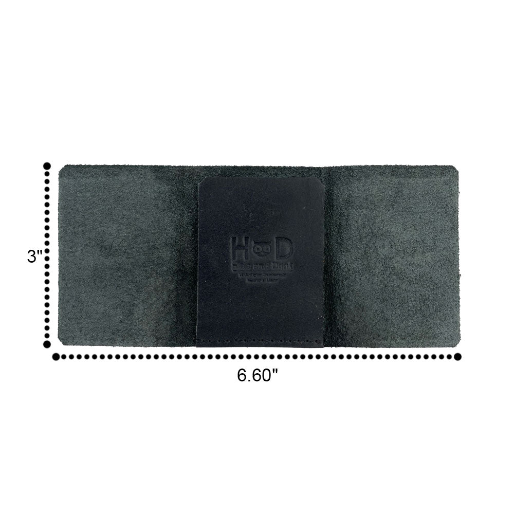 A captivating view of the Hide & Drink Minimalist Wallet Bills Only, showcasing its exterior in rich Full Grain Leather. This Ultra Minimalist Wallet doubles as an elegant cash organizer and reflects artisan craftsmanship from La Antigua Guatemala and Oaxaca Mexico.