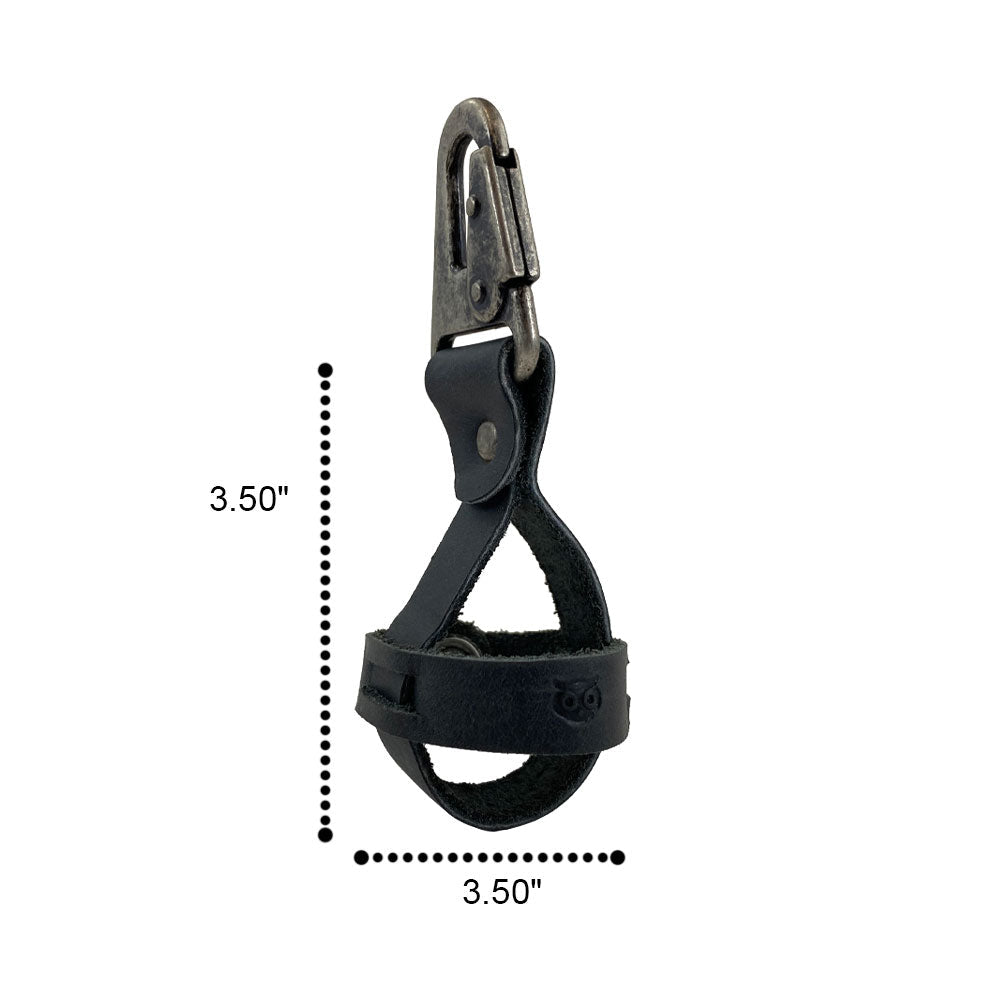 Detailed view of the Golf Ball Holder dimensions by Hide & Drink, showcasing its sturdy belt loop hook and unique design, made from rustic full grain leather. This artisan piece is hand cut, hand sewn, and fire branded in La Antigua Guatemala & Oaxaca Mexico.