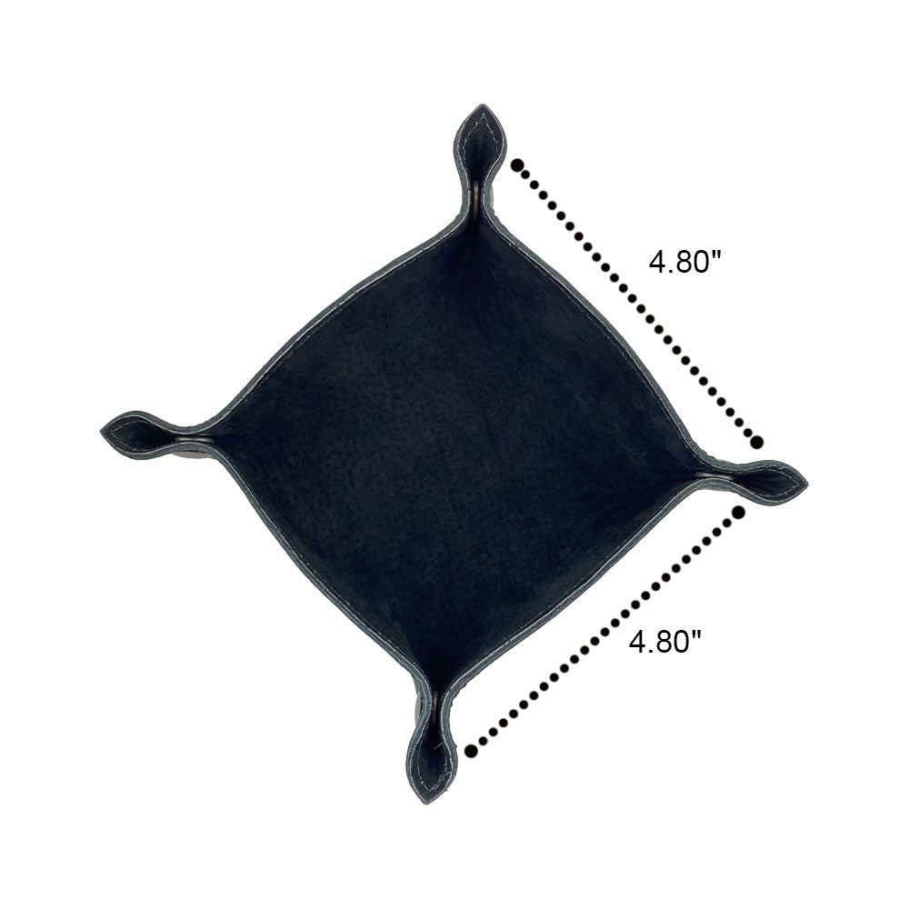 Overhead view of the Valet Tray with Sheep Skin from Hide & Drink, measuring 4.80 inches square. This stylish tray is the perfect small batch produced storage valet for personal items, designed for both home use and travel essentials. Made with artisan craftsmanship in La Antigua Guatemala & Oaxaca Mexico, incorporating full grain leather and sheepskin.