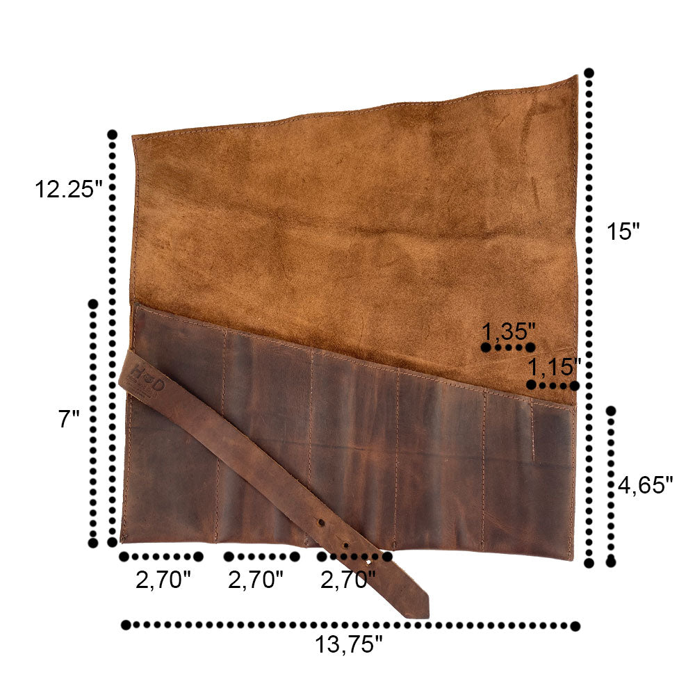 Hide & Drink's Large Tool Roll displayed with tools. This Portable Carry-On Pouch offers organization with 6 slots, ideal for woodworking tools. Featuring durable waxed canvas and full grain leather variations, this artisan piece is hand cut and sewn, representing handmade tradition in La Antigua Guatemala & Oaxaca Mexico.