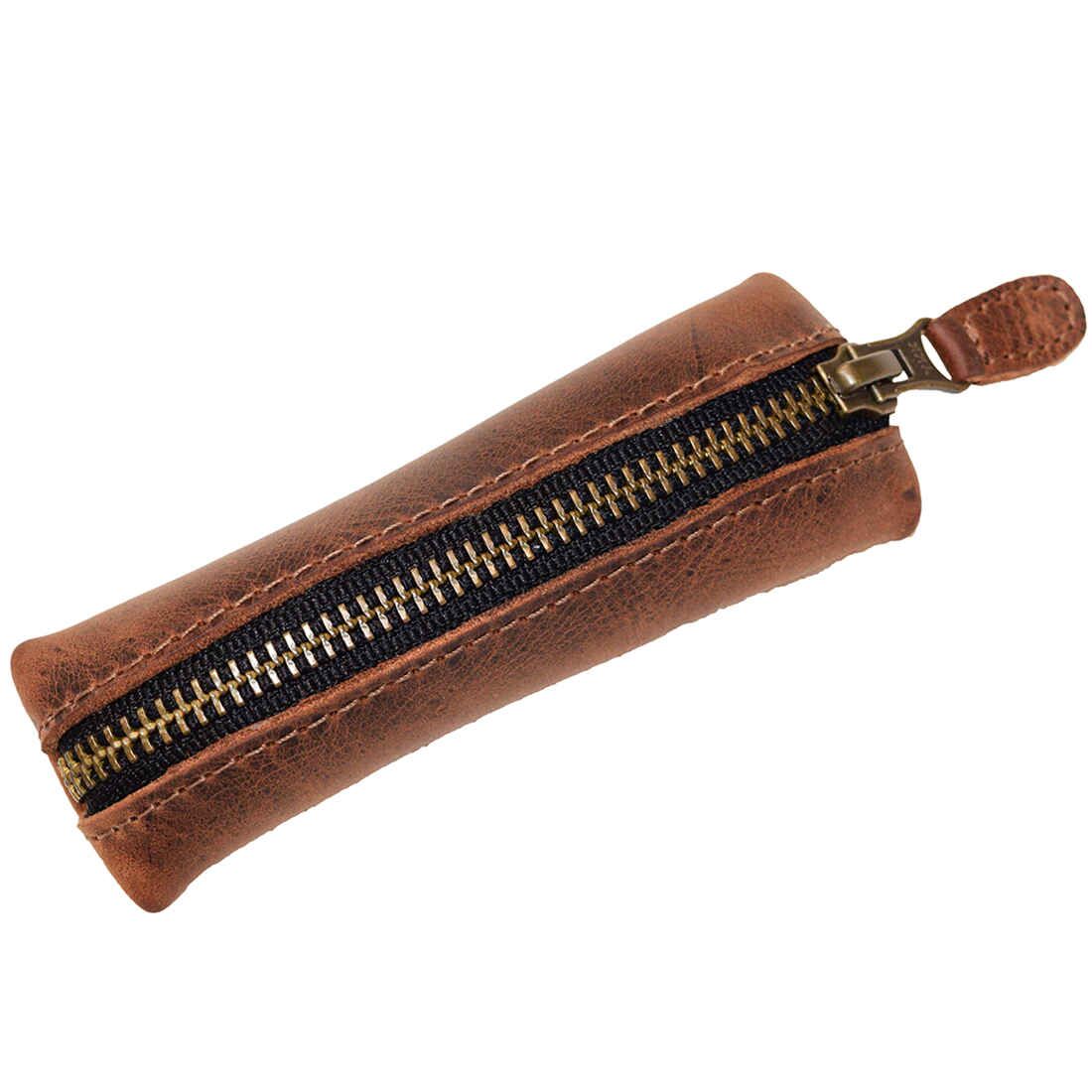 Side view of the Hide & Drink Long Coin Organizer, displaying its zipper detail and stylish design. This Long Coin Case serves as a practical Cash Holder and Rustic Case for Pennies, perfect for any vintage collection. Crafted in full grain leather, this product highlights Small Batch Production, with each item Hand Cut and Hand Sewn by skilled artisans, Fire Branded for authenticity, made in La Antigua Guatemala & Oaxaca Mexico.