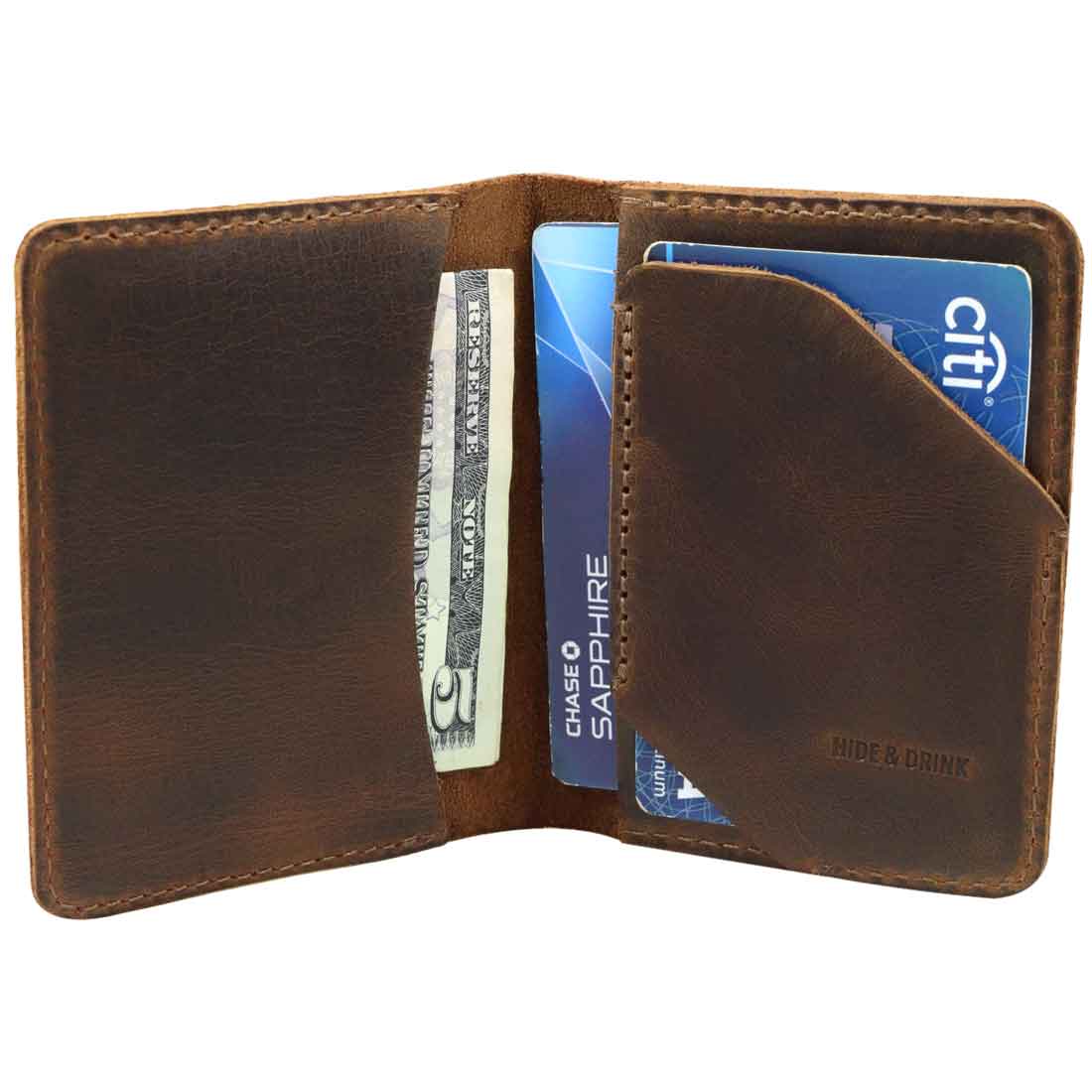 Open view of the Bi-Fold Card Wallet Diagonal by Hide & Drink, featuring space for cards and bills, showcasing its versatility as a cash organizer. Made from durable full grain leather, handcrafted in La Antigua Guatemala.