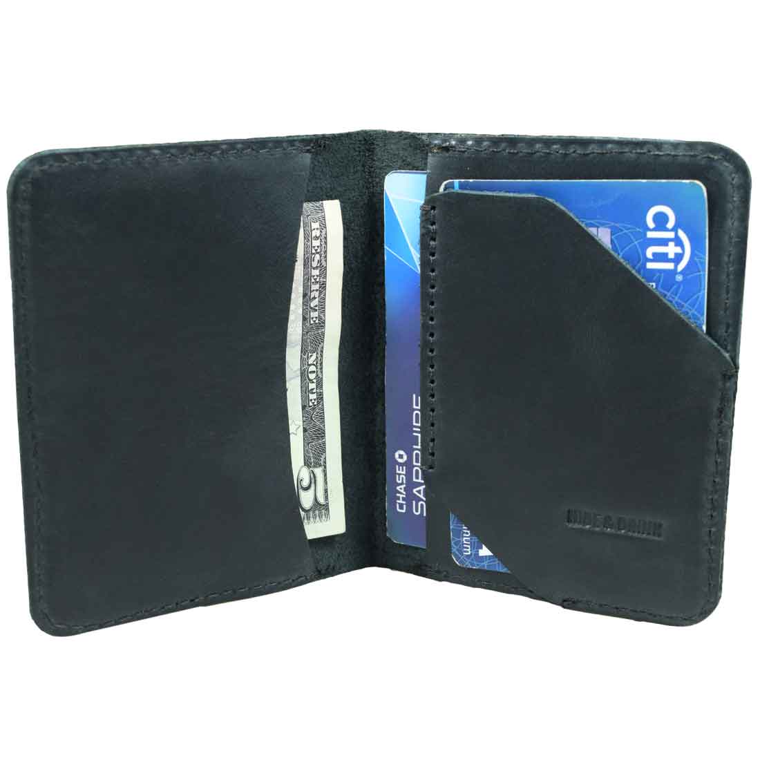 Bi-Fold Card Wallet Diagonal by Hide & Drink with cards displayed in a sleek black design, demonstrating its capacity and practical use as a cash organizer, made from premium full grain leather.