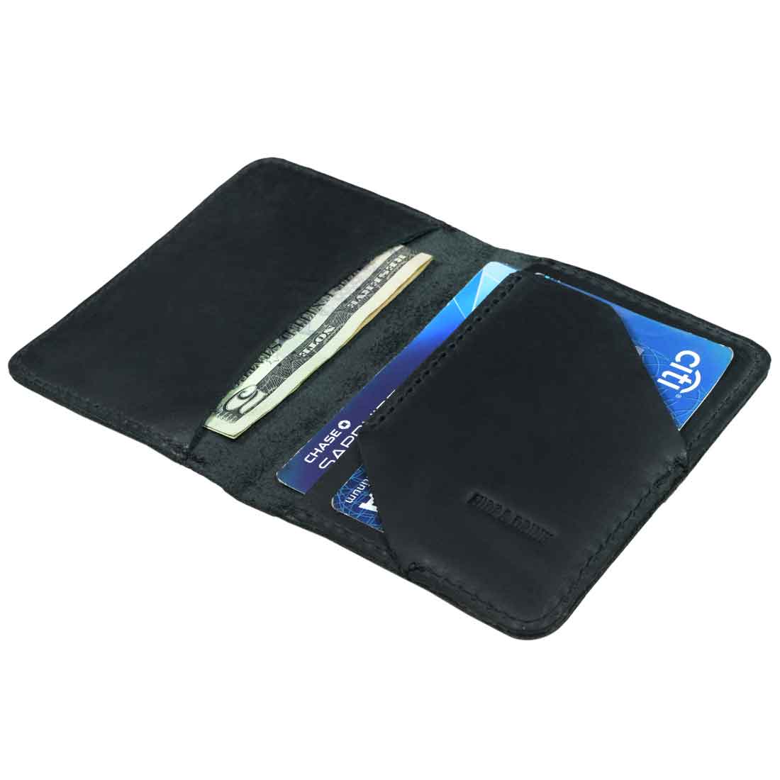 Closed view of the Bi-Fold Card Wallet Diagonal by Hide & Drink in black, showing its premium full grain leather, ideal for those who appreciate handmade, artisan-crafted accessories.