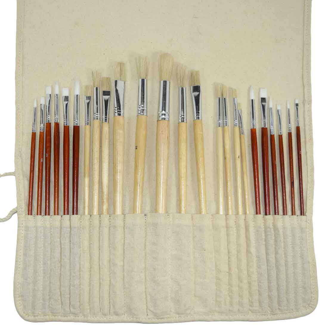 Detailed view of Paint Brush Roll-Up by Hide & Drink revealing multiple brush slots for storage and organization. This Artist Paint Brush Canvas Roll-Up with Leather Lining Storage Wrap / 24 Slots / Workshop Art Study contributes to artisan craftsmanship through small batch production. Fire branded and handmade in La Antigua Guatemala & Oaxaca Mexico.