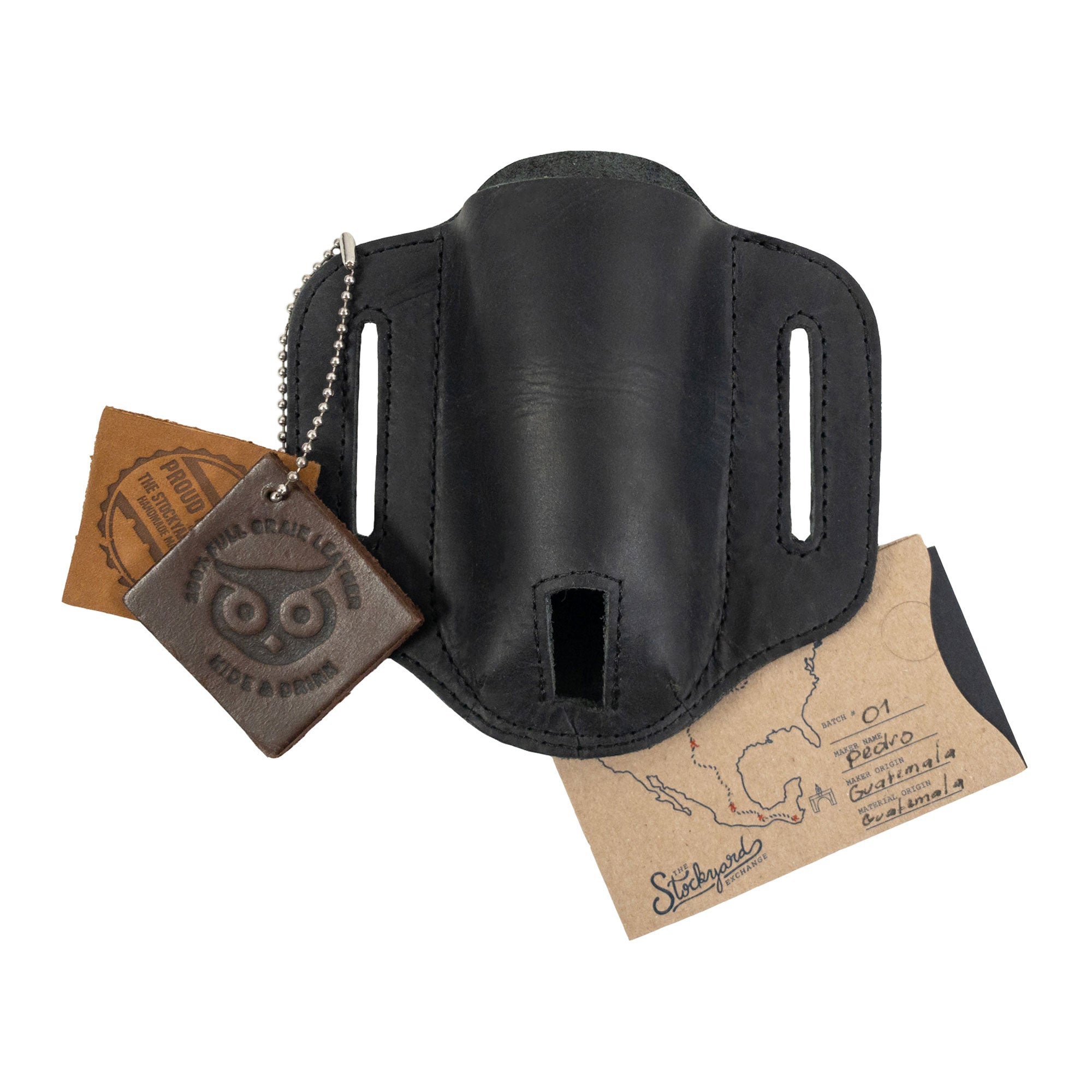 Hide & Drink Multitool Belt Sheath presented with a tag demonstrating its artisan origin. This product is perfect as a pocket knife set case, highlighting the craftsmanship involved in creating handmade accessories from full grain leather.