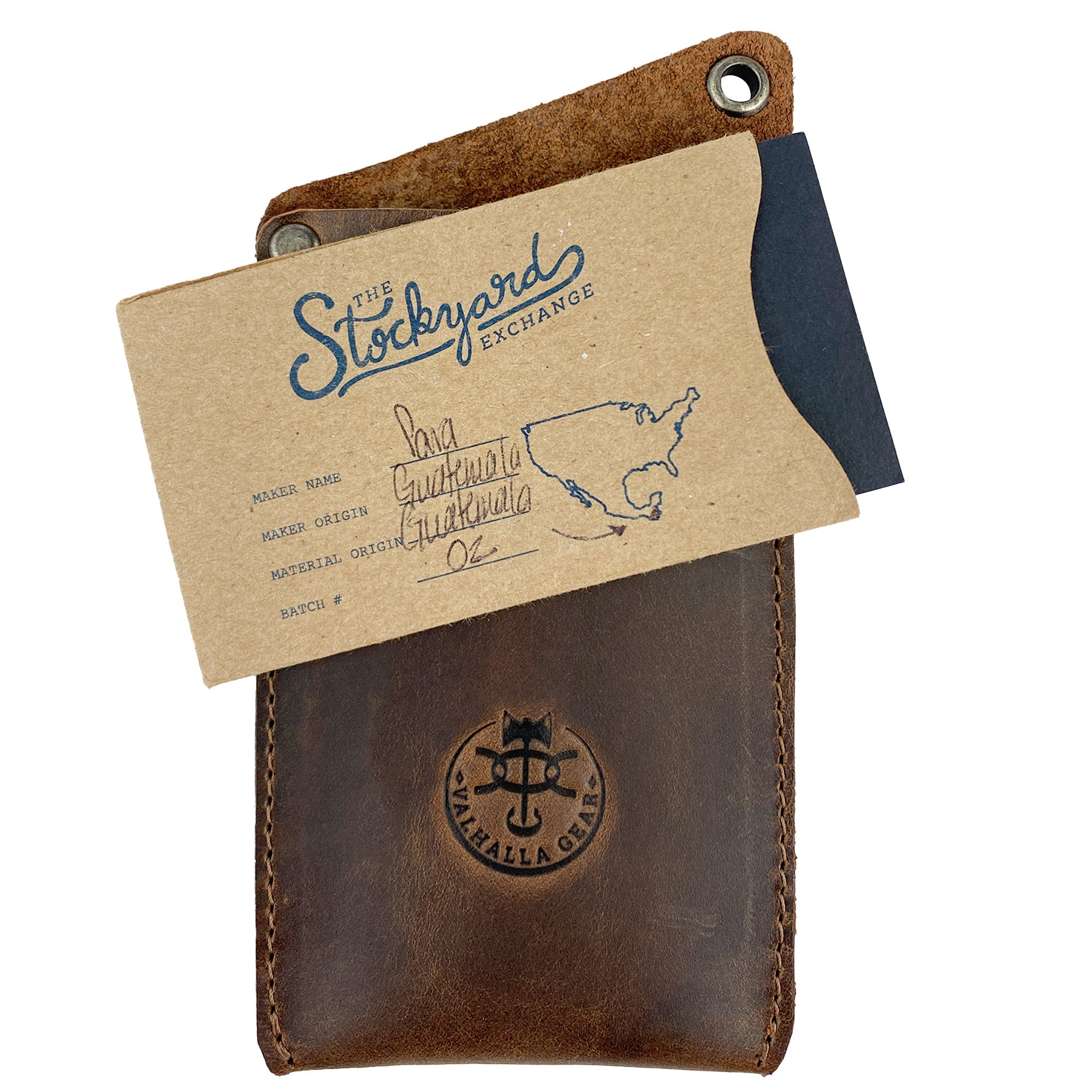 Valhalla Gear EDC Knife Sheath accompanied by a card showcasing its artisan quality. Made from full grain leather, this rectangular knife sheath is an ideal vertical holster for multitools and a practical tool case for camping and outdoor accessories. Hand cut and hand sewn in La Antigua Guatemala, fire branded for authenticity.
