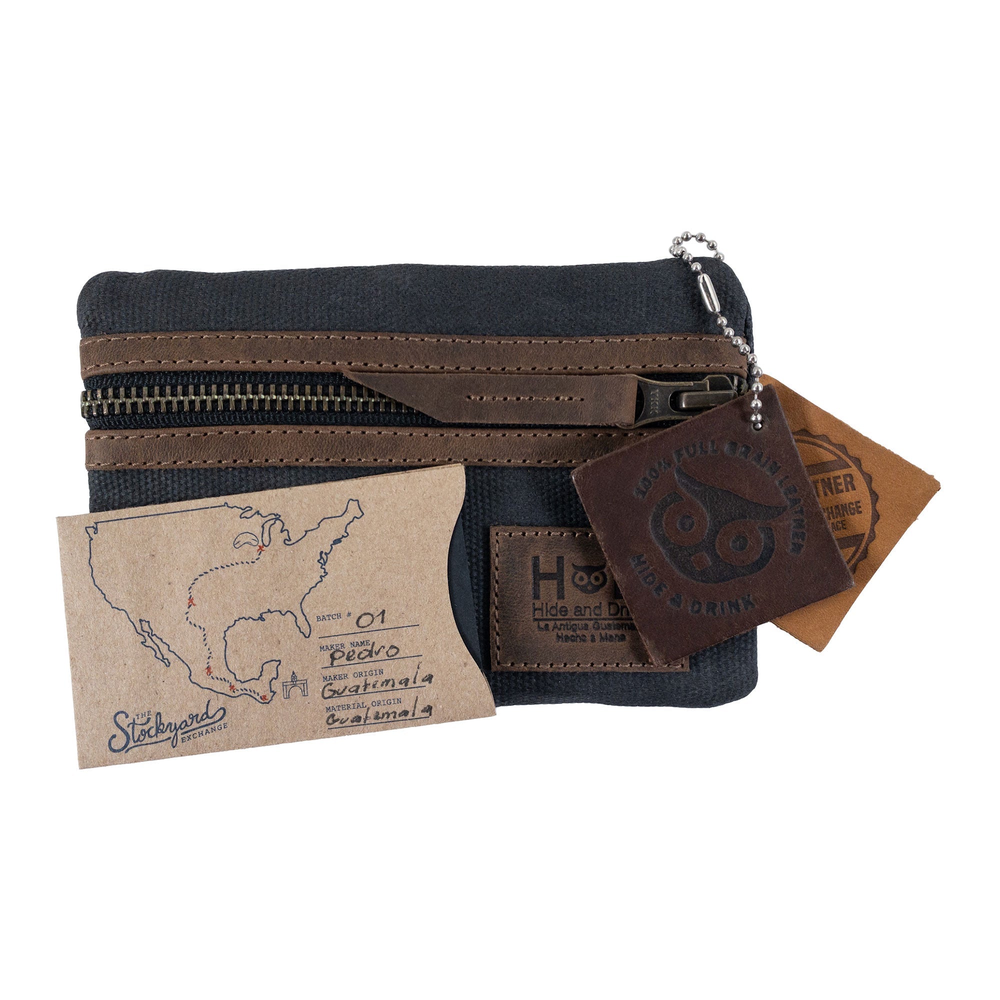 Packaging of the red Multi-tool Pocket Pouch by Hide & Drink, introducing its artisan production with included tags.