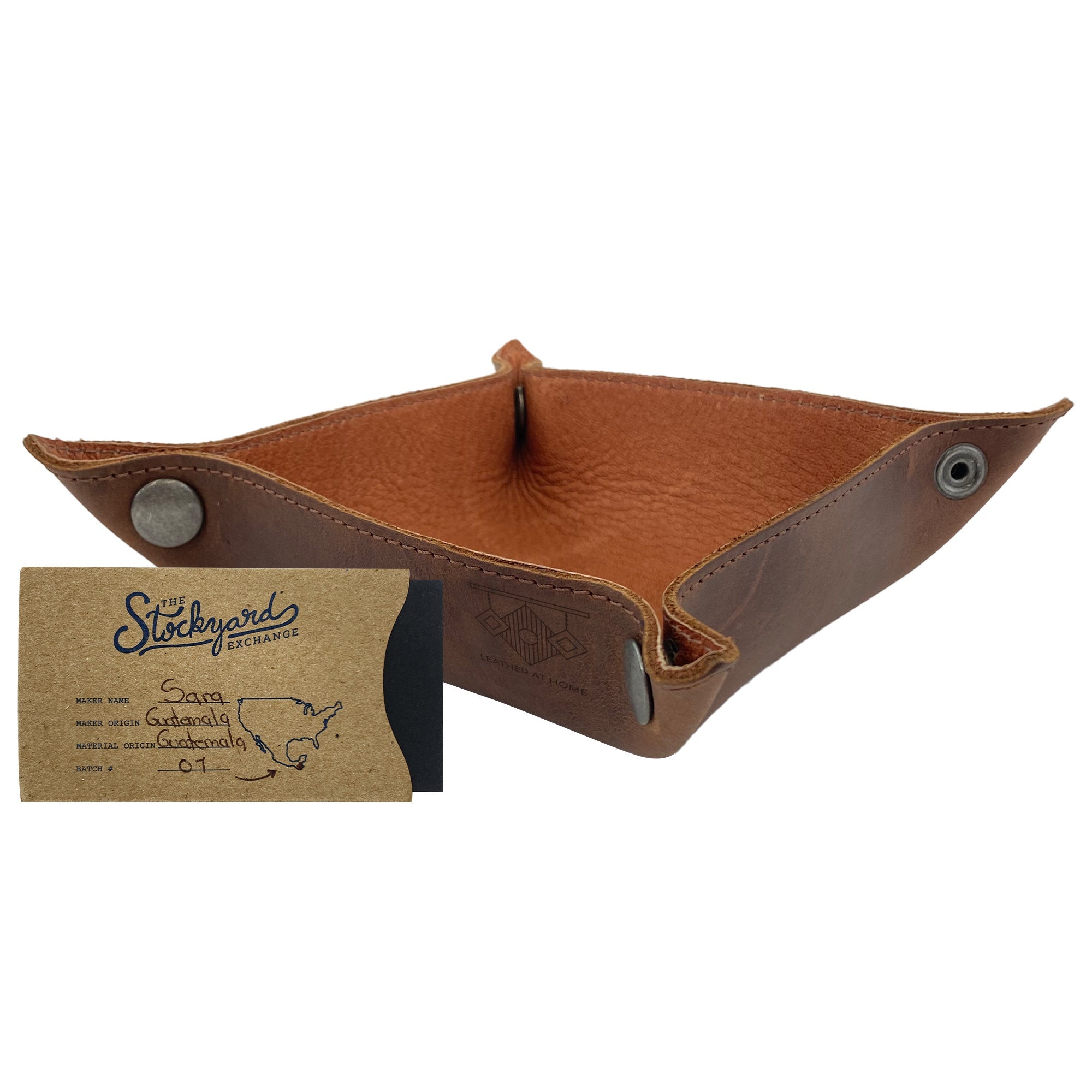 Squared Catchall by Leather At Home featuring an elegant design alongside a business card, perfect for home organization as a catchall or change key wallet. Built from full grain leather with artisan craftsmanship, ideal for both home and travel essentials.