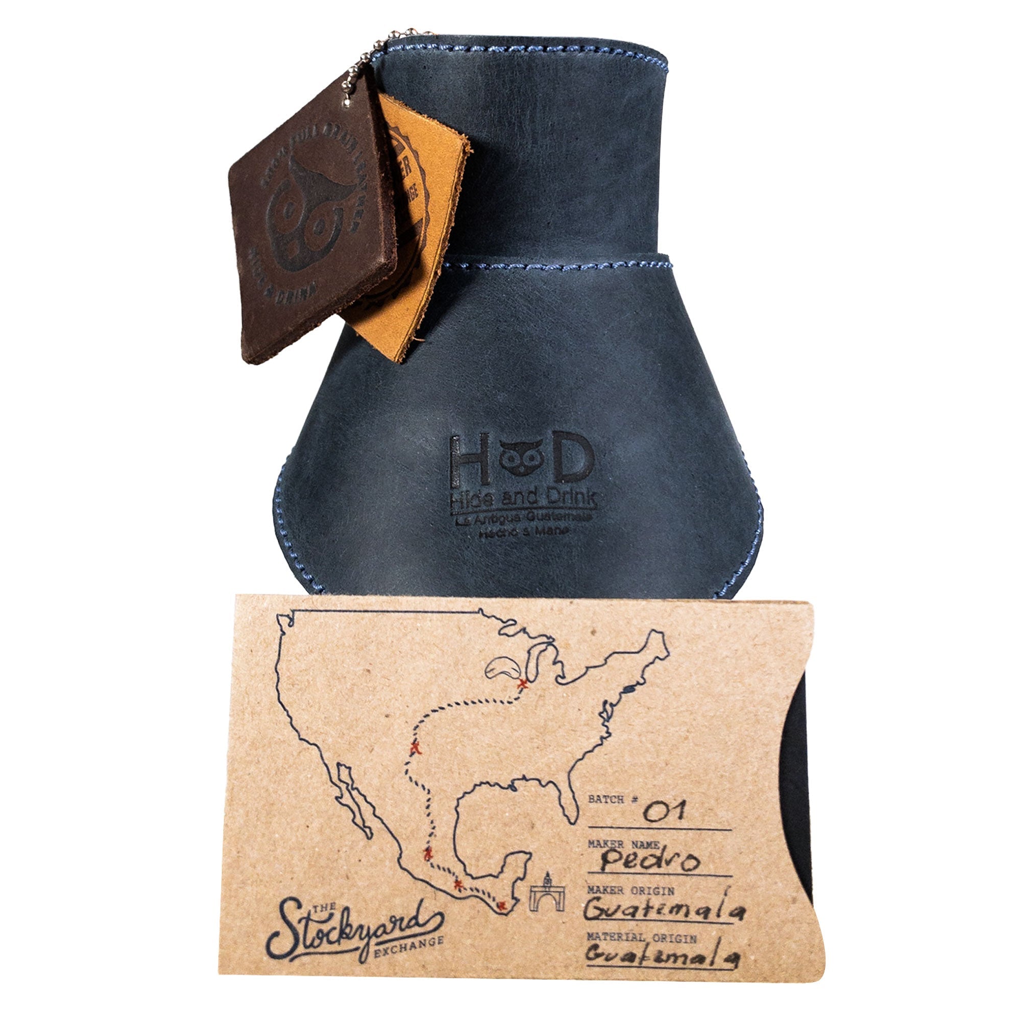 Showcase of Hide & Drink Chemex Collar in navy leather lying flat, featuring quality craftsmanship. Designed as a pour over collar compatible with Chemex 6-Cup Glass, made in La Antigua Guatemala & Oaxaca Mexico.
