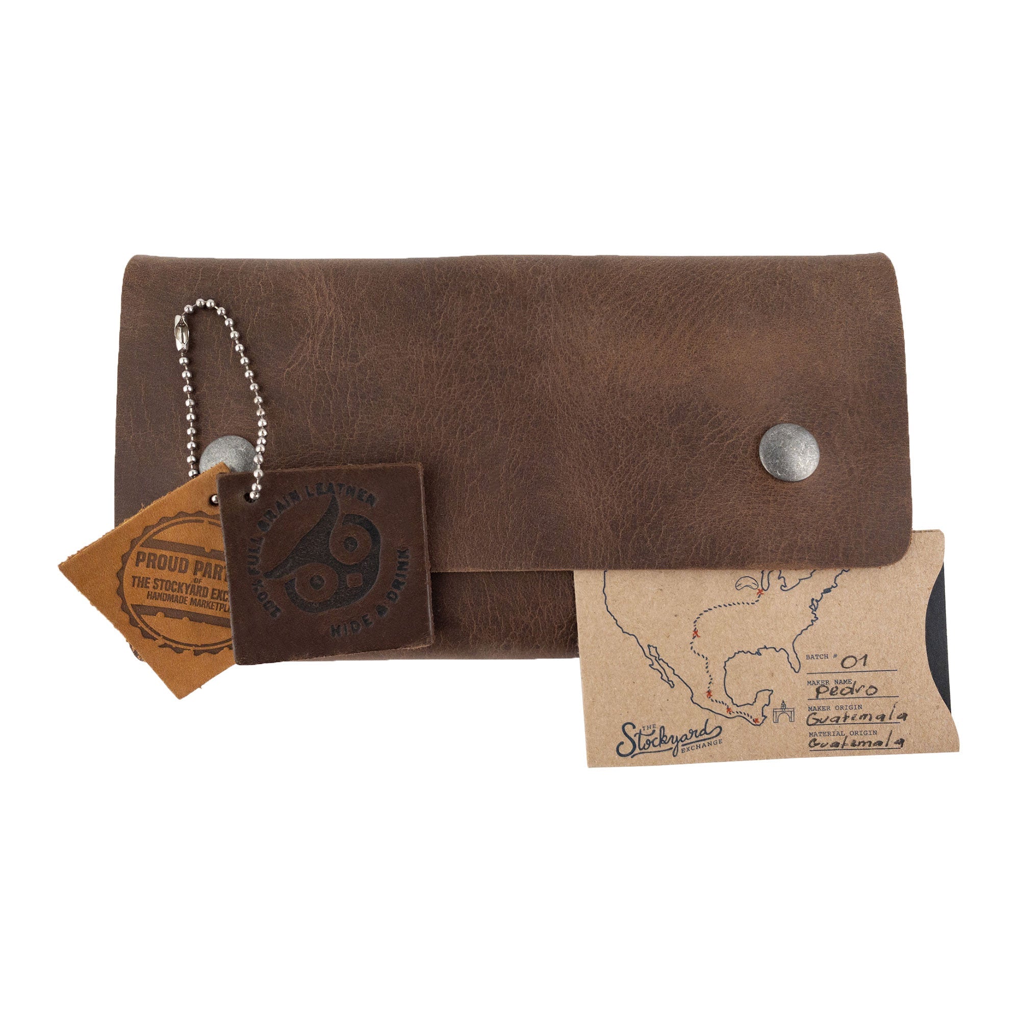Hide & Drink's Playing Card Case displayed with branding and tags, emphasizing its handmade quality and durable Full Grain Leather. This card bag is ideal for organizing and storing cards and dice for travel and poker games, made in La Antigua Guatemala & Oaxaca Mexico.
