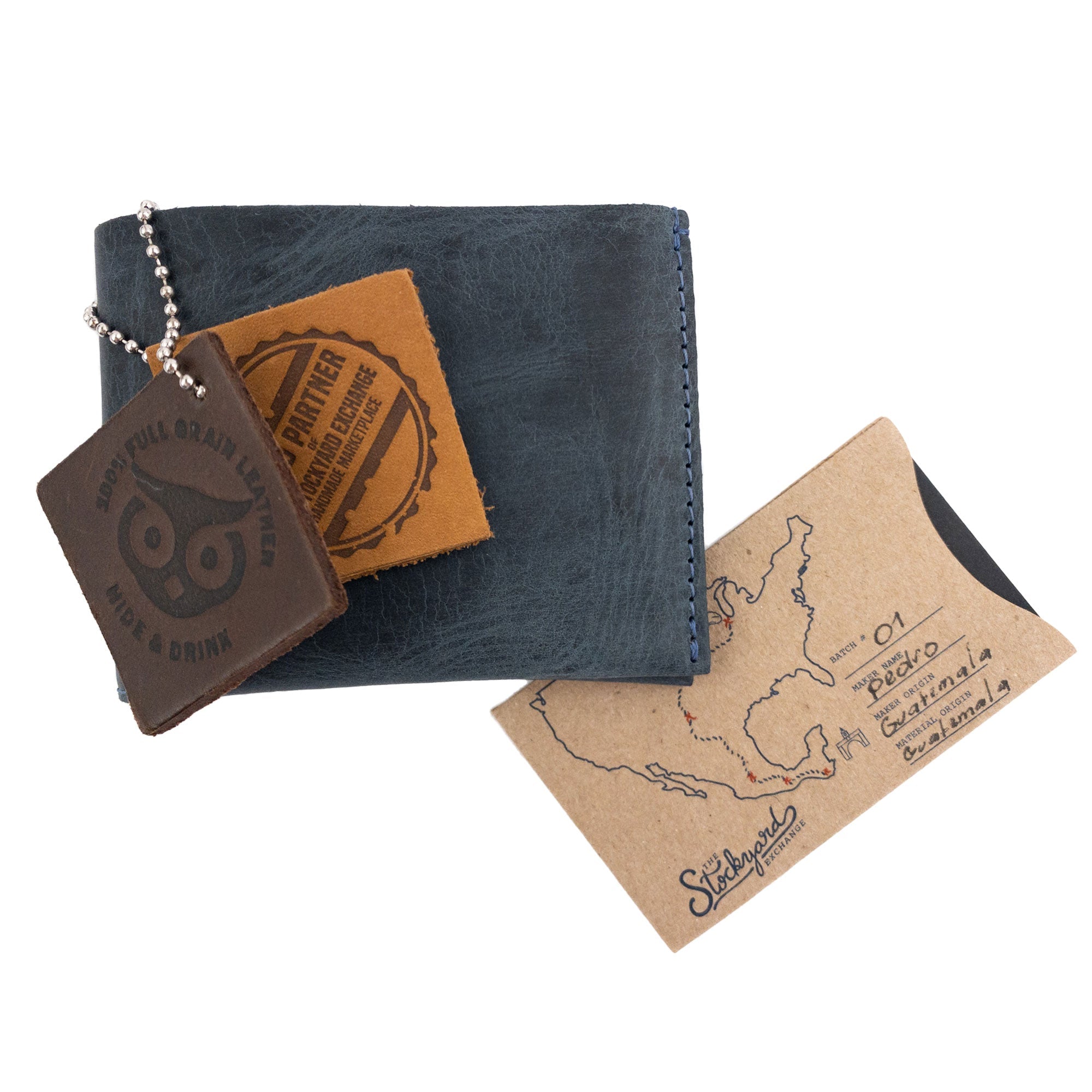 Close view of the brown Hide & Drink Classic Wallet opened to show its inside compartments for cards and cash. Classic Wallet, Card Organizer, Money Holder, Vintage Pocket, Travel Accessories, Full Grain Leather, StockyardX, Small Batch Production, Hand Cut, Hand Sewn, Fire Branded, Artisan, Handmade in La Antigua Guatemala & Oaxaca Mexico.
