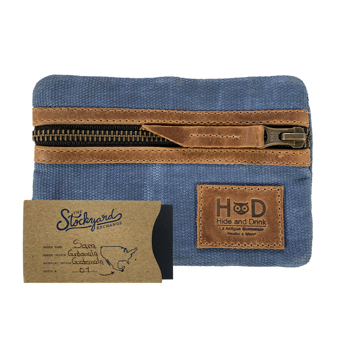 Packaging of the blue Multi-tool Pocket Pouch by Hide & Drink, featuring tags that emphasize its handmade production in La Antigua Guatemala.