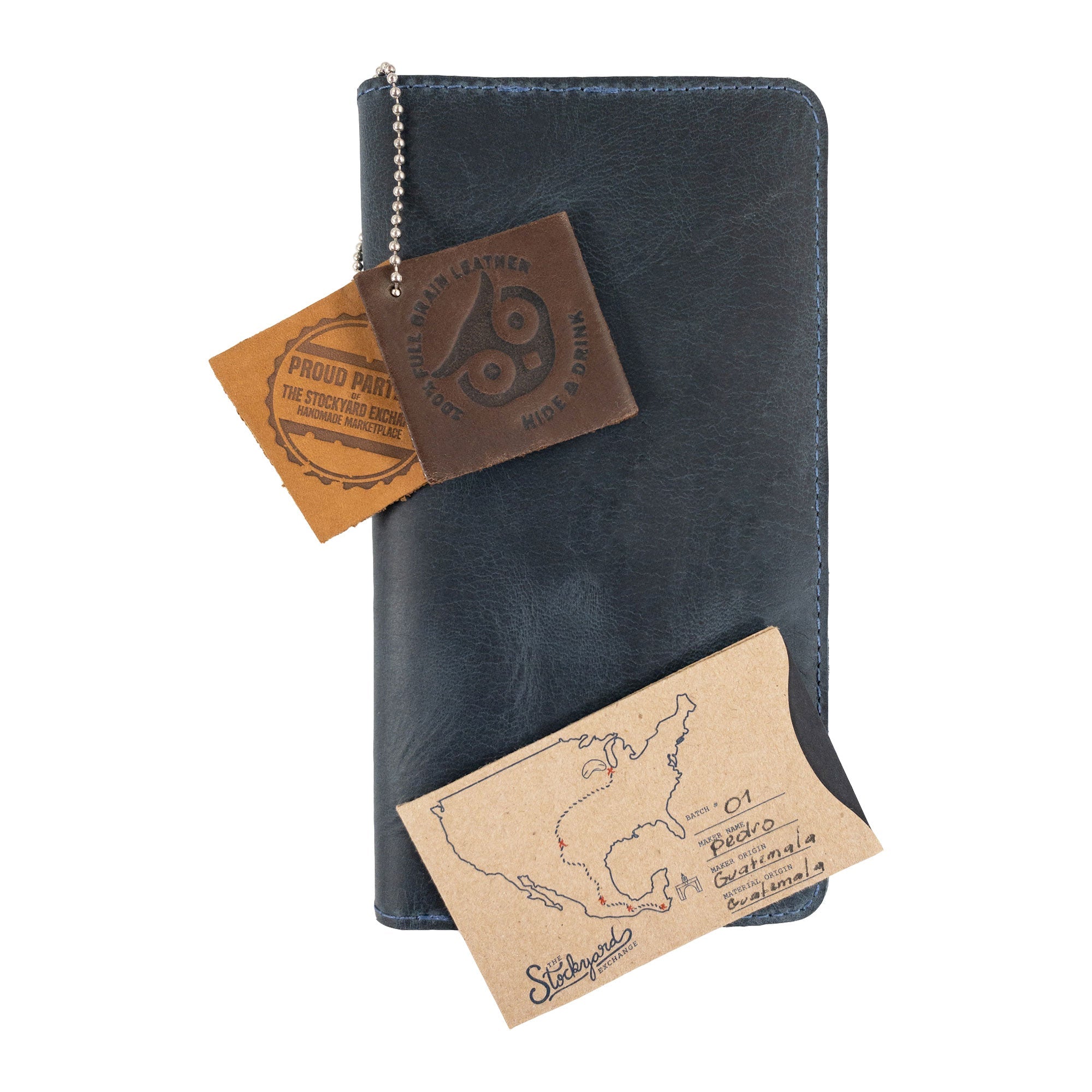 Hide & Drink Large Organizer Wallet showing an open view with practical compartments for cards and cash. This handmade bifold wallet is a durable travel accessory crafted from full grain leather, reflecting quality artisan work made in La Antigua Guatemala & Oaxaca Mexico.