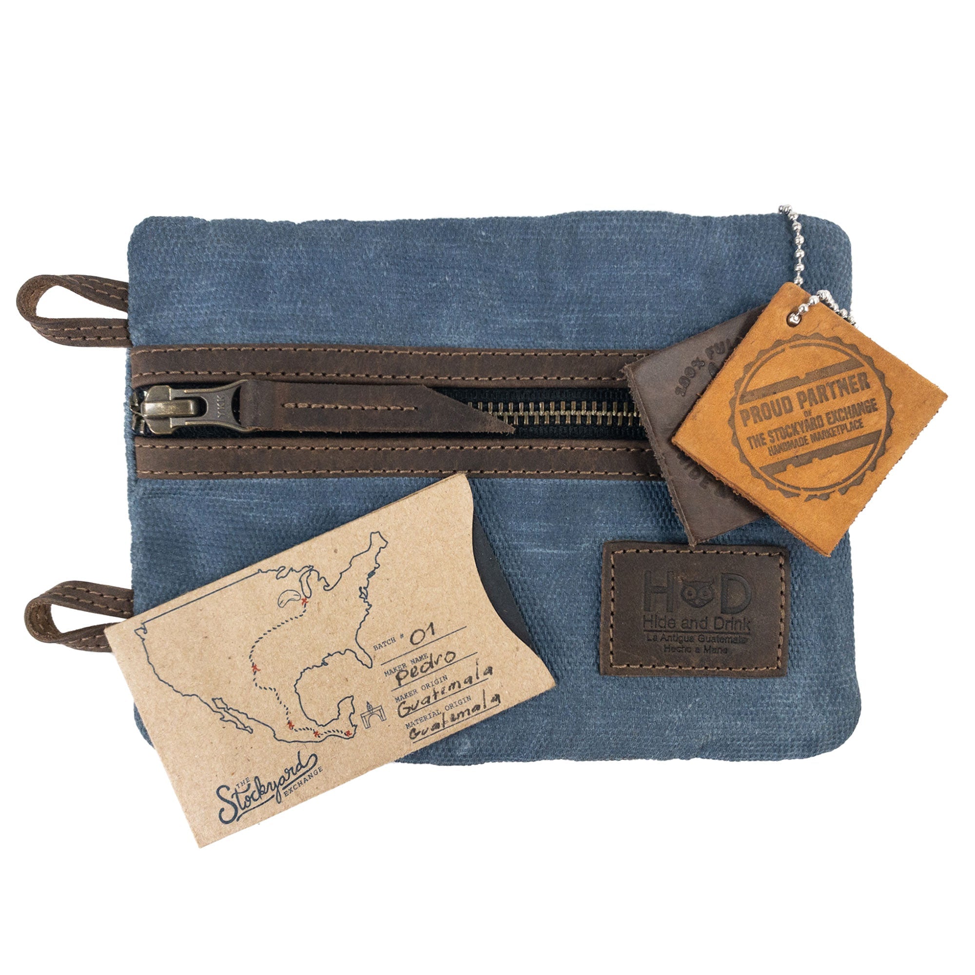Back view of the black Multi-tool Pocket Pouch - XL by Hide & Drink featuring organizational sleeves, emphasizing quality craftsmanship and design. Multi-Tool Pocket Pouch XL, Compact Multipurpose EDC Zippered Bag, Mini Camping Tool Case, Knife Holster, Handmade Slim Organizer, Waxed Canvas, StockyardX, Small Batch Production, Artisan, Handmade in La Antigua Guatemala & Oaxaca Mexico.