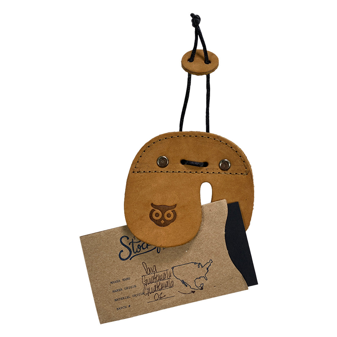 The Hide & Drink Left Handed Archery Finger Protector presented prominently to highlight its luxury texture. This Archery Finger Tab is an effective Protect Guard for Recurve Bows, constructed from quality Full Grain Leather for your shooting practice gear. Artisan-crafted by StockyardX, showcasing small batch production ethos.