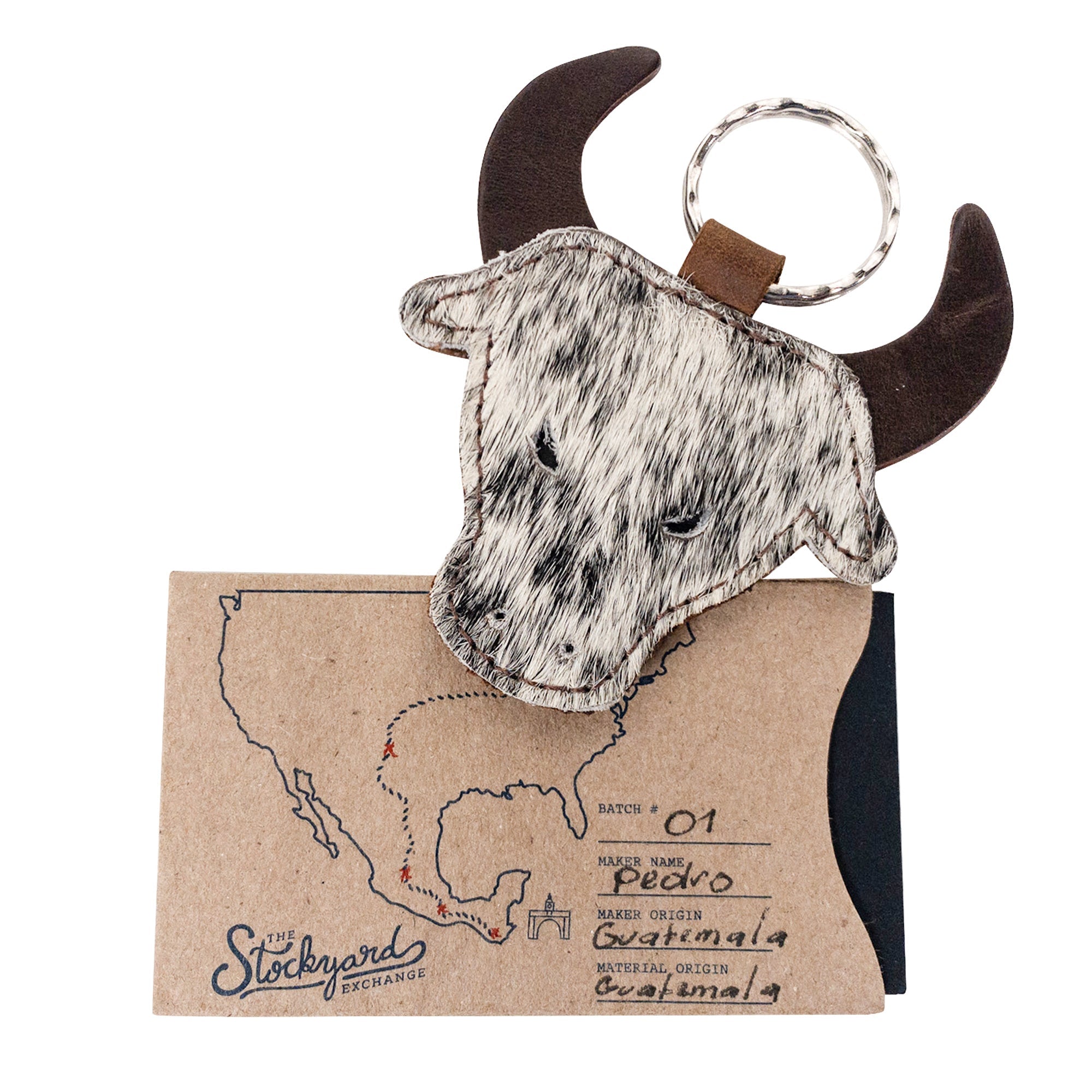 Cowboy Bull Head Keychain by Western Leather Works presented with packaging, representing the uniqueness of this artisan product. This keyring holder is a distinctive accessory for cowboys and cowgirls, reflecting small batch production, hand cut, hand sewn, fire branded quality, handmade in La Antigua Guatemala & Oaxaca Mexico.