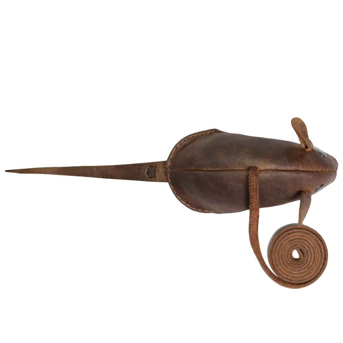 A side view of Hide & Drink's Cat Toy, resembling a charming furry mouse. This Cats Exerciser Toy is lovingly crafted from full grain leather, perfect for engaging your cat in playful activities. Hand cut and hand sewn, this artisan product highlights the dedication to quality and craftsmanship from La Antigua Guatemala. An excellent addition to your collection of Cat Toys, it offers both fun and durability.