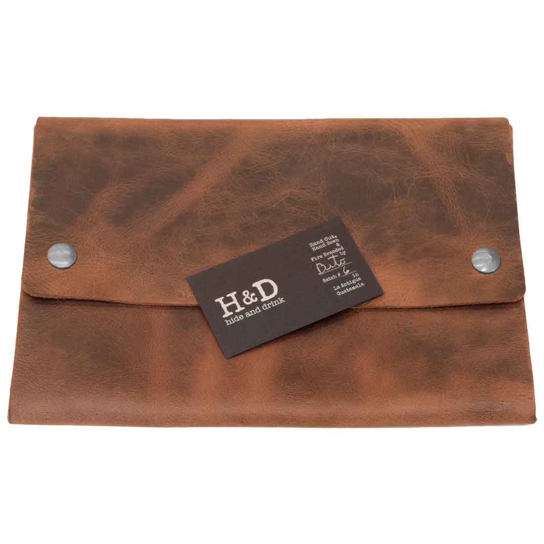 Hide & Drink's Multipurpose Portfolio with a business card, highlighting its practical design and Full Grain Leather craftsmanship for organizing travel essentials, keys, and more. Artisan handmade in La Antigua Guatemala & Oaxaca Mexico.