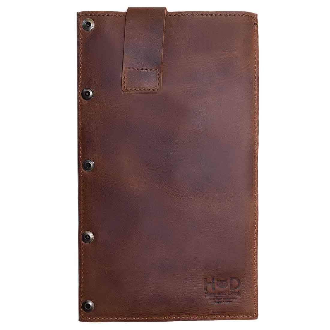 Hide & Drink Butcher Knife Holster displayed flat, highlighting the elegant design and premium full grain leather. This rustic sheath is perfect for cleaver butcher knives, measuring 4.25 x 8.25 in., crafted with care through small batch production that emphasizes artisan quality from exceptional craftsmen in La Antigua Guatemala & Oaxaca Mexico.