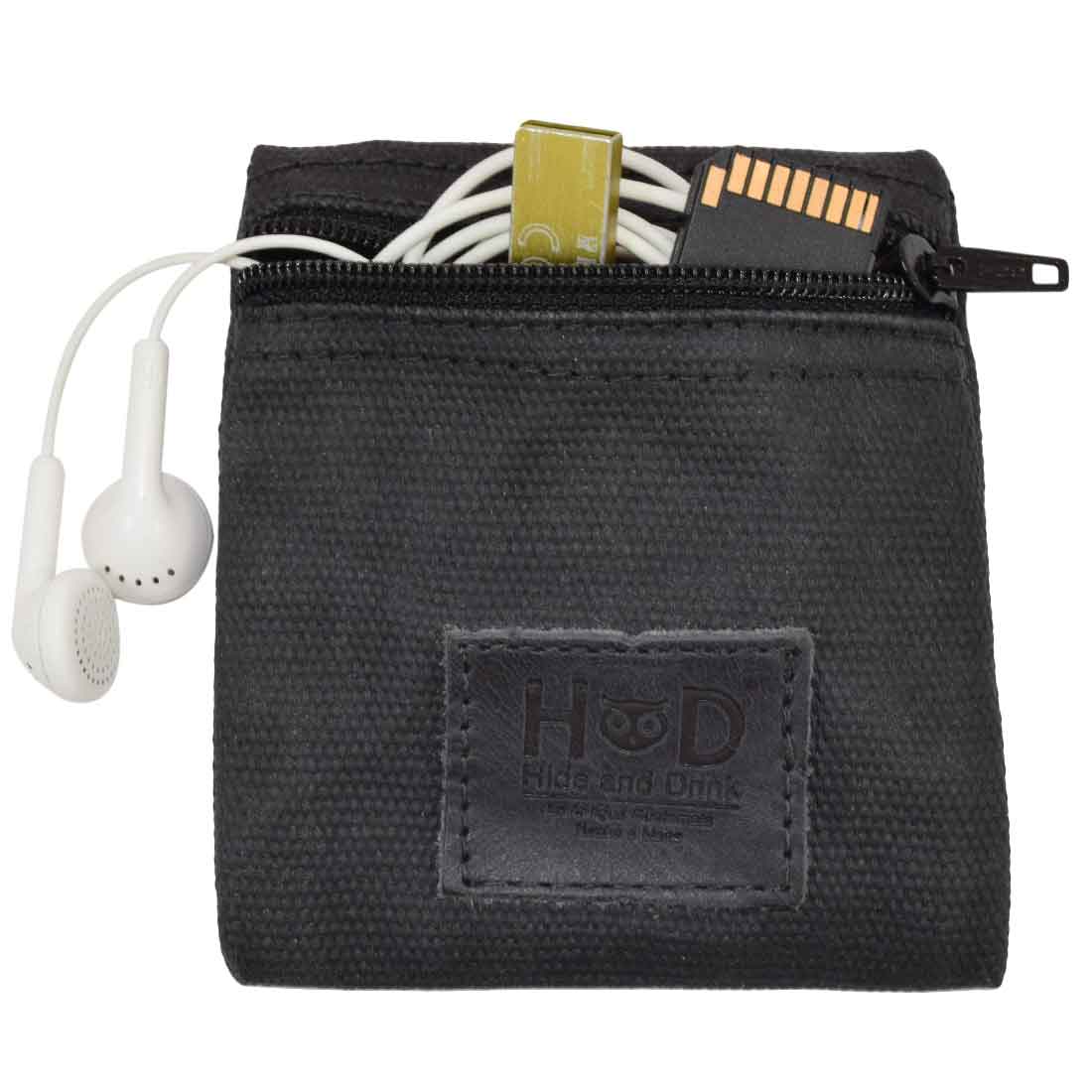 Hide & Drink Condom Pouch with a blue condom, featuring durable water resistant waxed canvas. This multifunctional pocket purse is a practical classic partner gift ideal for travel. Handmade in La Antigua Guatemala ensures quality artisan production.