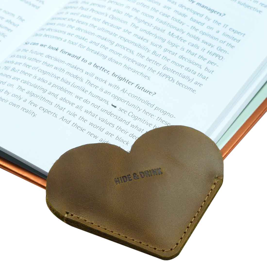Leather Corner Heart Bookmark (2 pack) by Hide & Drink in tan, made from premium Full Grain Leather. This artisan product showcases meticulous craftsmanship with hand cut and hand sewn techniques, handcrafted in La Antigua Guatemala and Oaxaca Mexico.