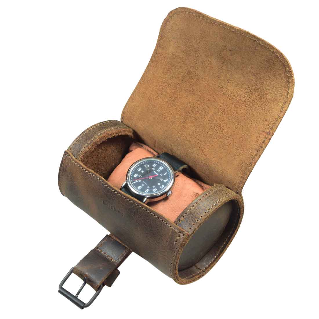 Inside view of Hide & Drink Single Watch Case, highlighting the luxurious plush cushion. This Cylinder Watch Case with Cushion serves as a perfect jewelry organizer and travel accessory, crafted from premium Full Grain Leather. Handmade in La Antigua Guatemala & Oaxaca Mexico, emphasizing artisan craftsmanship with hand cut and fire branded details.