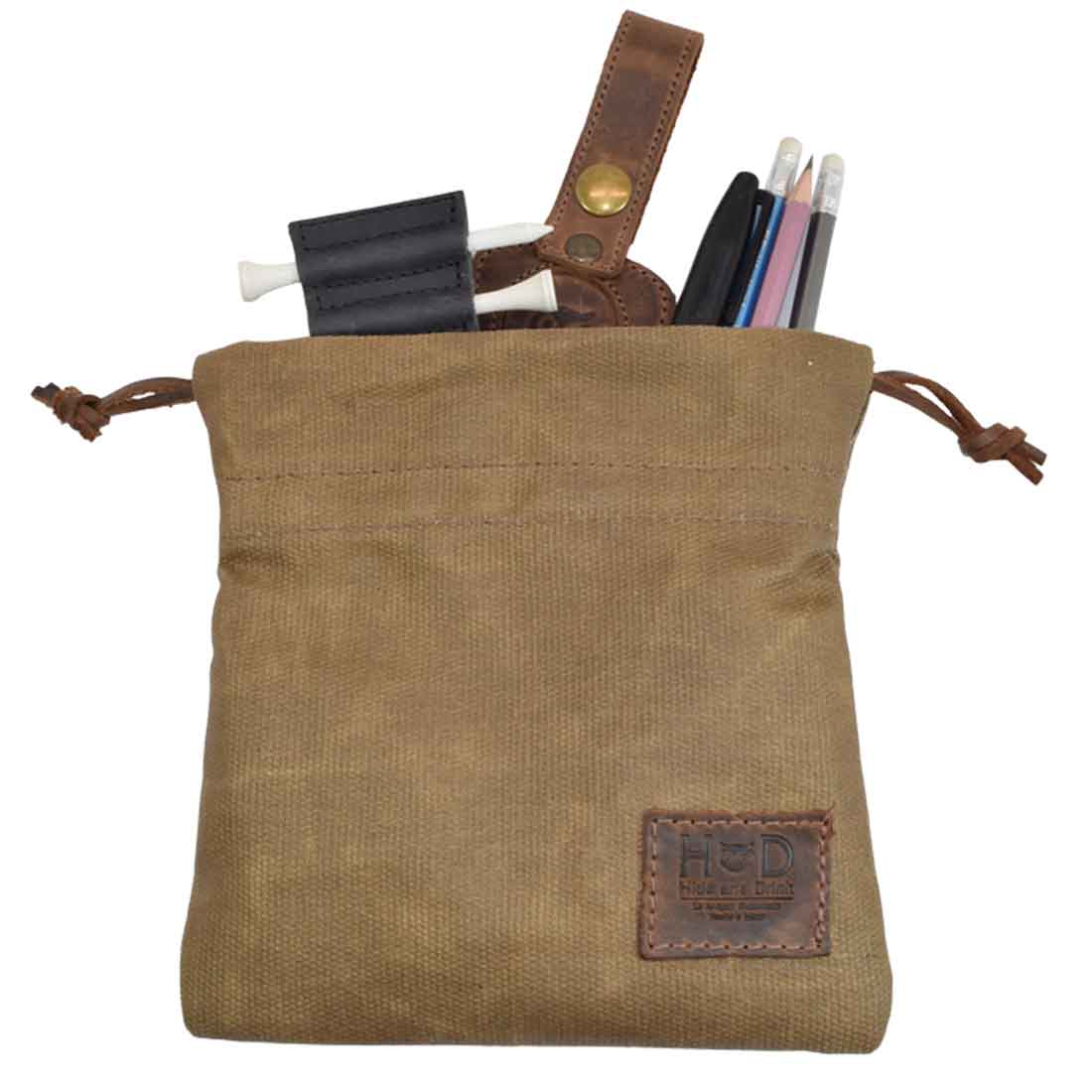 Hide & Drink Golf Pouch in a light brown shade, perfect for golf essentials or various small items. This durable waxed canvas pouch features a cinch closure and is ideal for organizing items in your golf bag. Waxed Canvas Golf Valuables Field Pouch, Golf Bag, Sport Organizer, Multipurpose Pouch with String, StockyardX, Small Batch Production, Hand Cut, Hand Sewn, Fire Branded, Artisan, Handmade in La Antigua Guatemala & Oaxaca Mexico.