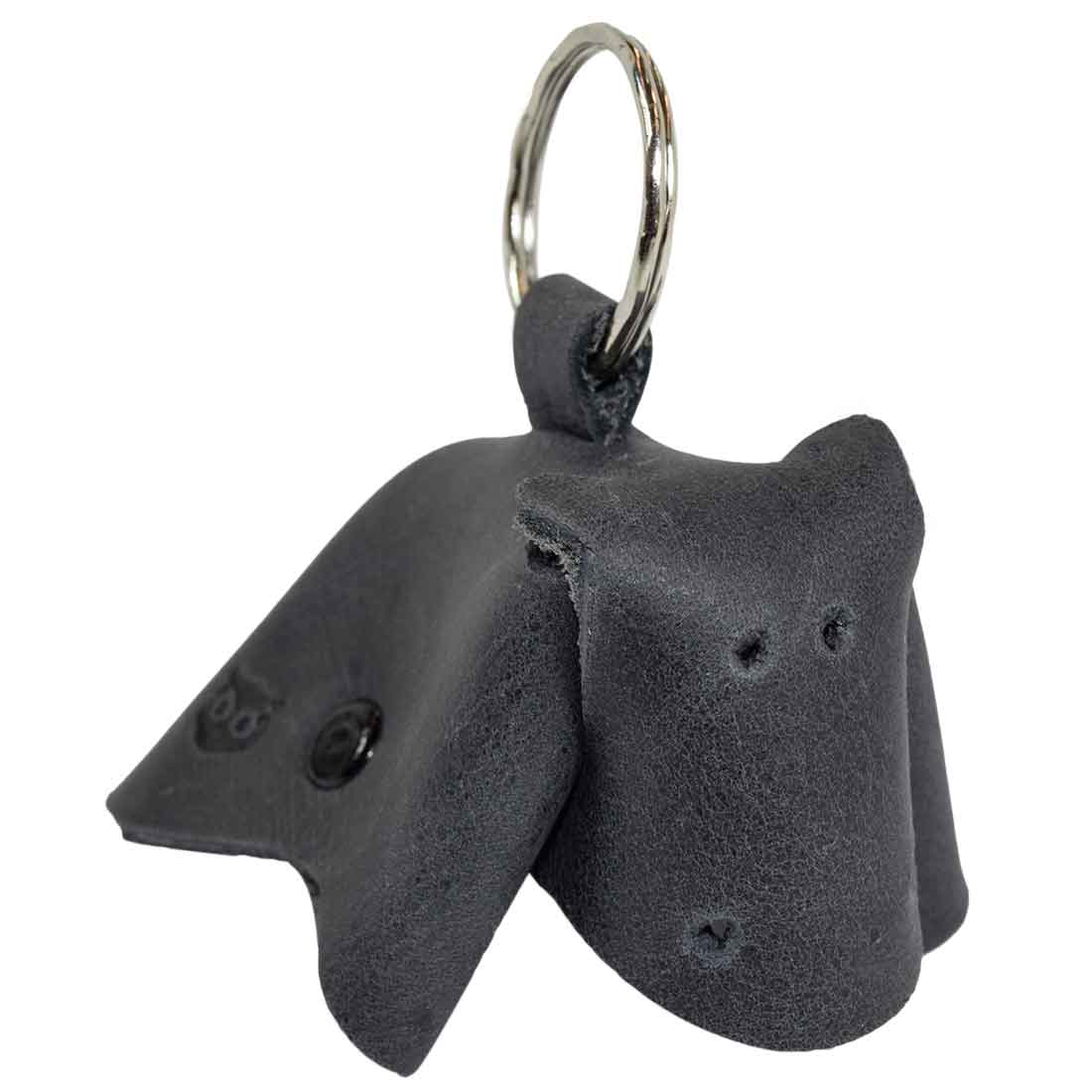 Distinctive Full Grain Leather Animal Key Chain from Hide & Drink featuring an adorable cow design. This Critter Keychain works perfectly as a fun fob charm and a practical animal key holder charm pendant, showcasing artisan work from La Antigua Guatemala.