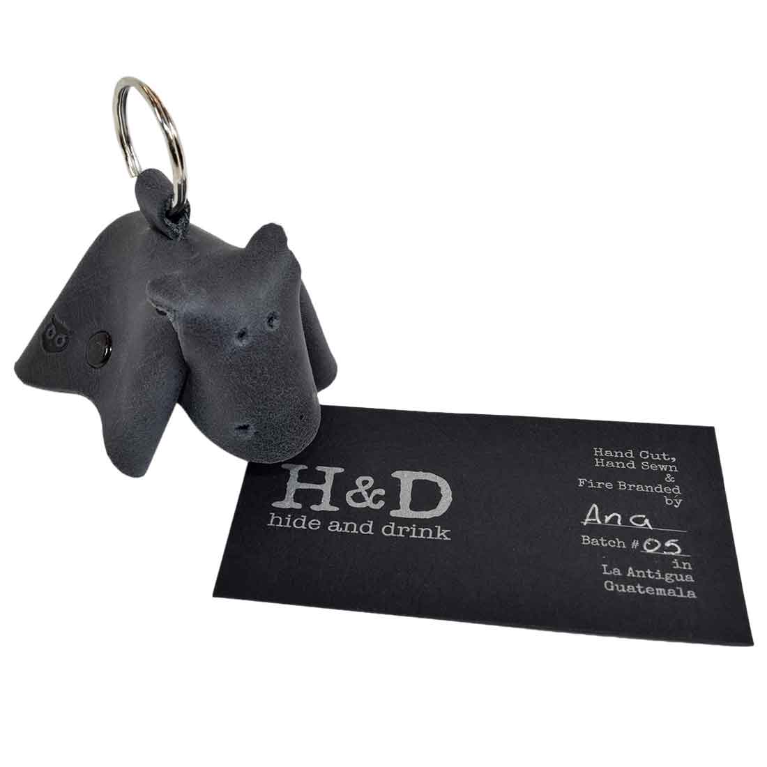 Artisan-crafted Full Grain Leather Animal Key Chain by Hide & Drink, showcasing a unique cow design. This lovely Critter Keychain serves as both a trendy fob charm and an animal key holder charm pendant, emphasizing small batch production in La Antigua Guatemala.