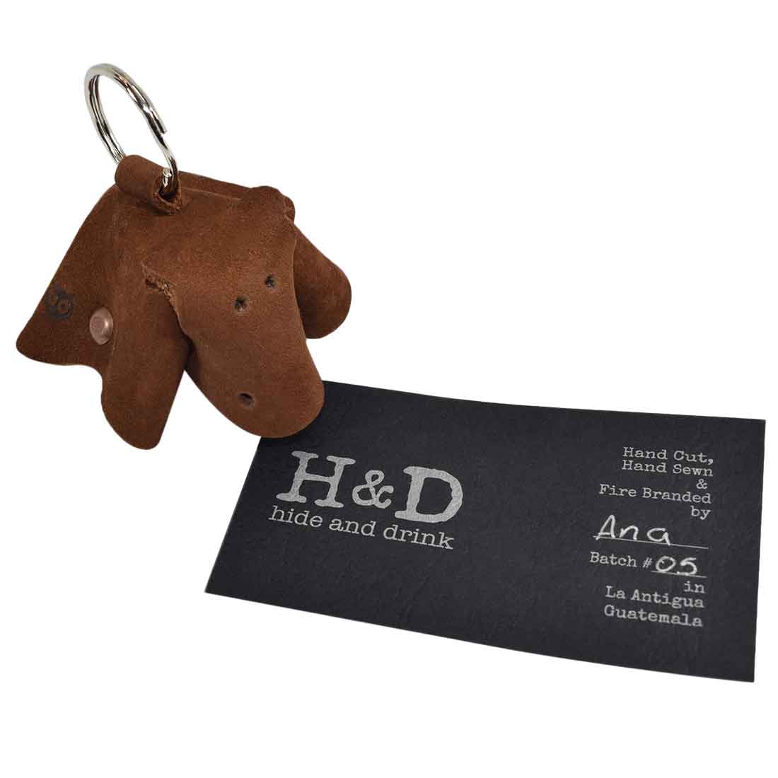 Full Grain Leather Animal Key Chain from Hide & Drink with a charming cow theme. This Critter Keychain serves both as a distinctive fob charm and a practical animal key holder charm pendant, demonstrating small batch artisan quality from La Antigua Guatemala.