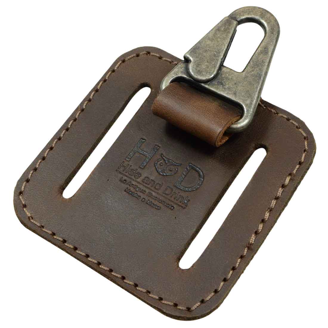 Front view of the elegant Belt Key Holder by Hide & Drink, highlighting the vintage keychain clasp attached to a sturdy leather backing. This handmade accessory combines classic travel essentials with artisan craftsmanship from La Antigua Guatemala & Oaxaca Mexico.
