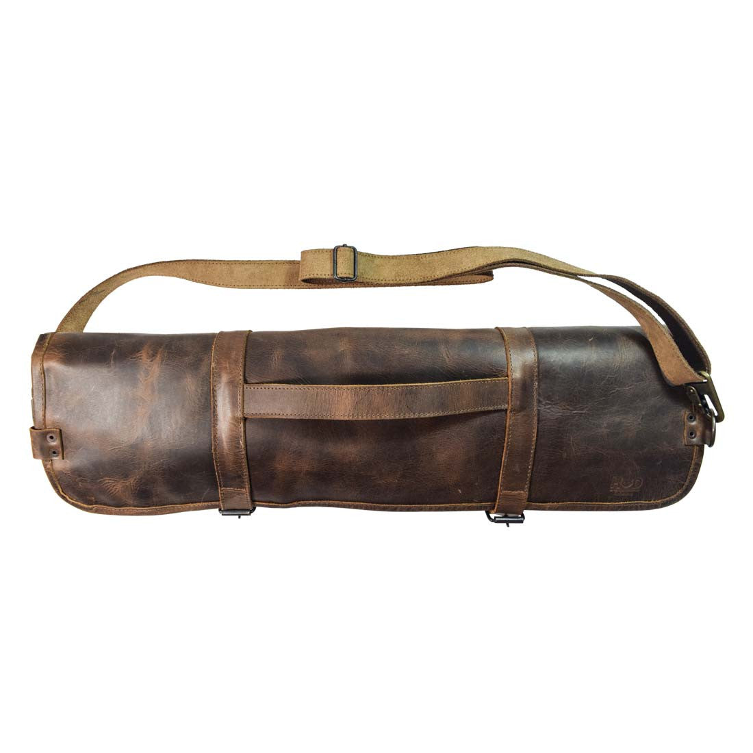 Hide & Drink Knife Roll With Water Resistant Lining (8 Pockets) secured with straps. A stylish Chef's Knife Roll Bag (8 Pockets) designed for portability, ideal as a cooking accessory and travel bag.