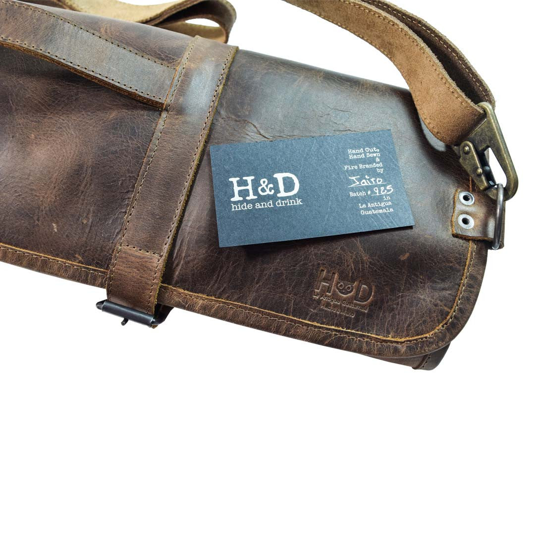 Close-up of Hide & Drink Knife Roll With Water Resistant Lining (8 Pockets) showcasing the leather texture. This artisan-crafted Chef's Knife Roll Bag (8 Pockets) is your ultimate portable knife organizer for cooking accessories.