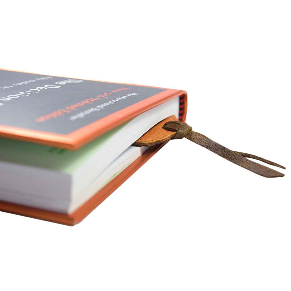 Deluxe Long Bookmark (2 Pack) by Hide & Drink, showing a leather bookmark inserted in a book. This elegant reversible page marker is a classic accessory for any reading lover, constructed from full grain leather, showcasing stockyardX, small batch production, hand cut, hand sewn, fire branded, artisan craftsmanship, handmade in La Antigua Guatemala & Oaxaca Mexico.