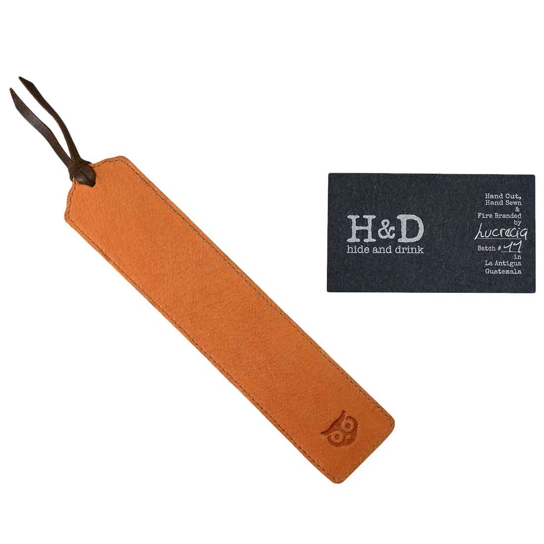 Deluxe Long Bookmark (2 Pack) from Hide & Drink, featuring a light brown bookmark with business card. A versatile reversible page marker, perfect as a classic book or journal accessory for reading lovers, made from full grain leather, emphasizing stockyardX, small batch production, hand cut, hand sewn, fire branded, artisan quality, handmade in La Antigua Guatemala & Oaxaca Mexico.
