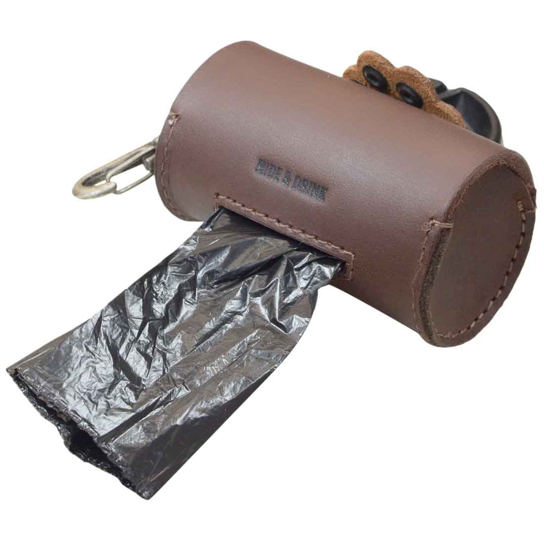 Paw Poop Pouch from Hide & Drink, showcasing a practical design with the ability to dispense bags. This Full Grain Leather pouch is a must-have for pet owners, ideal for dog walker essentials. Artisan-made in La Antigua Guatemala & Oaxaca Mexico, ensuring quality through small batch production.