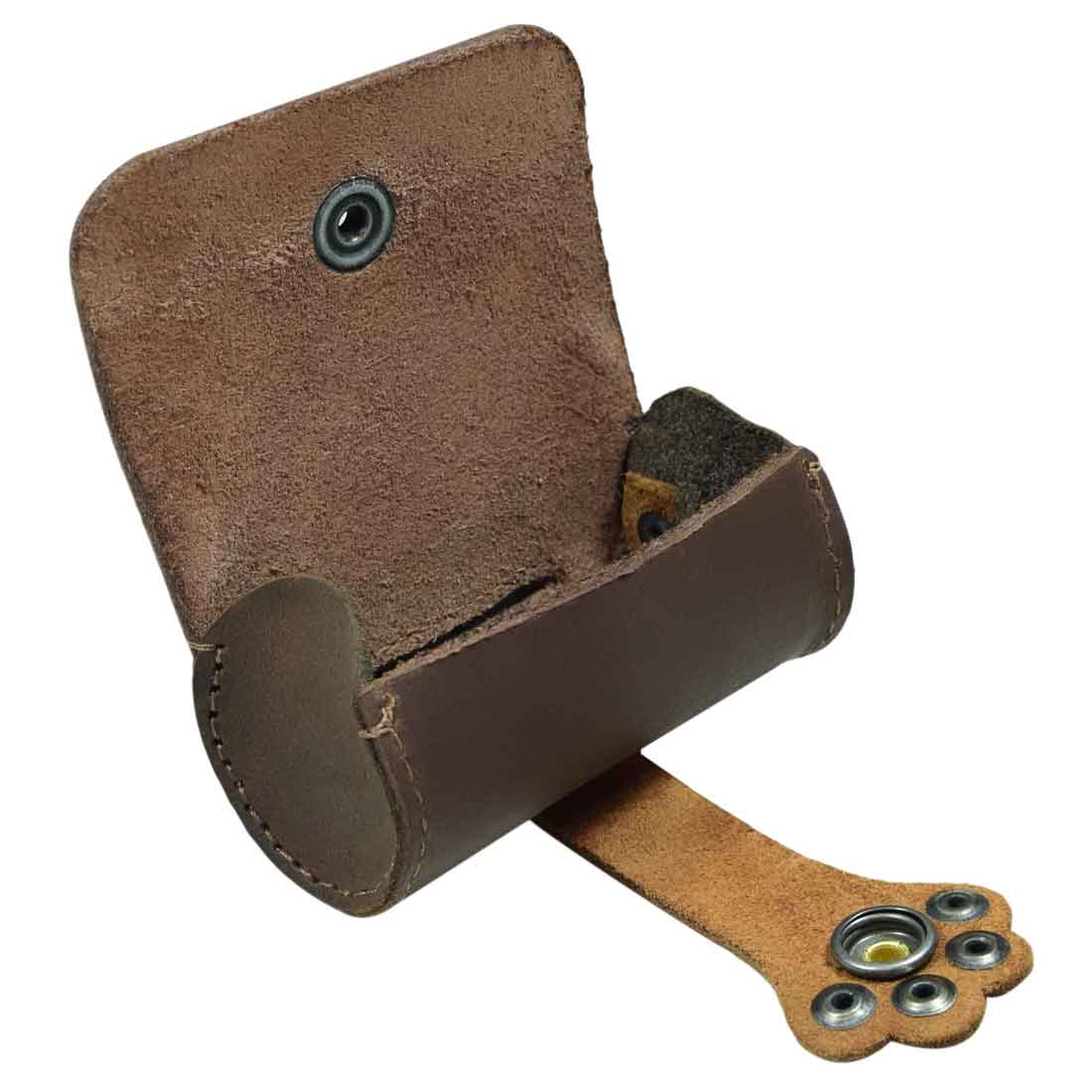 Dimensions of the Hide & Drink Paw Poop Pouch, comparing size with a roll of waste bags. This stylish full grain leather pouch is perfect for pet supplies, emphasizing the quality of small batch production and artisan craftsmanship in La Antigua Guatemala & Oaxaca Mexico.